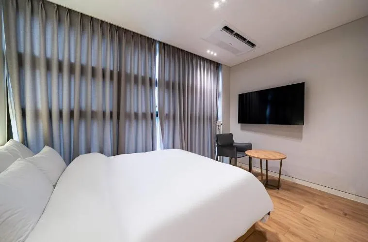 Bed in Lagobaum Hotel