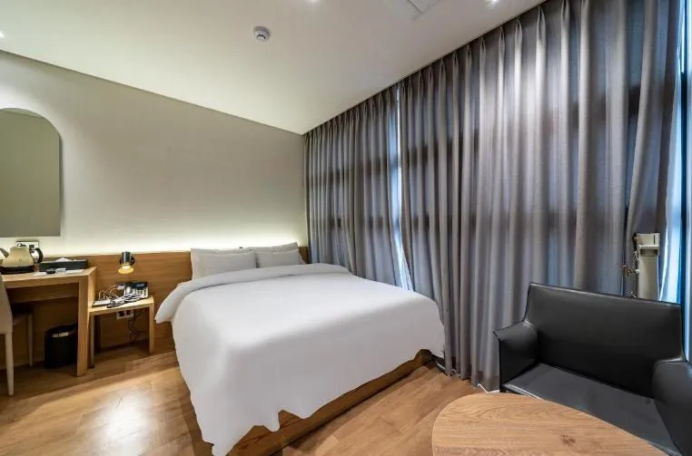 Bed in Lagobaum Hotel