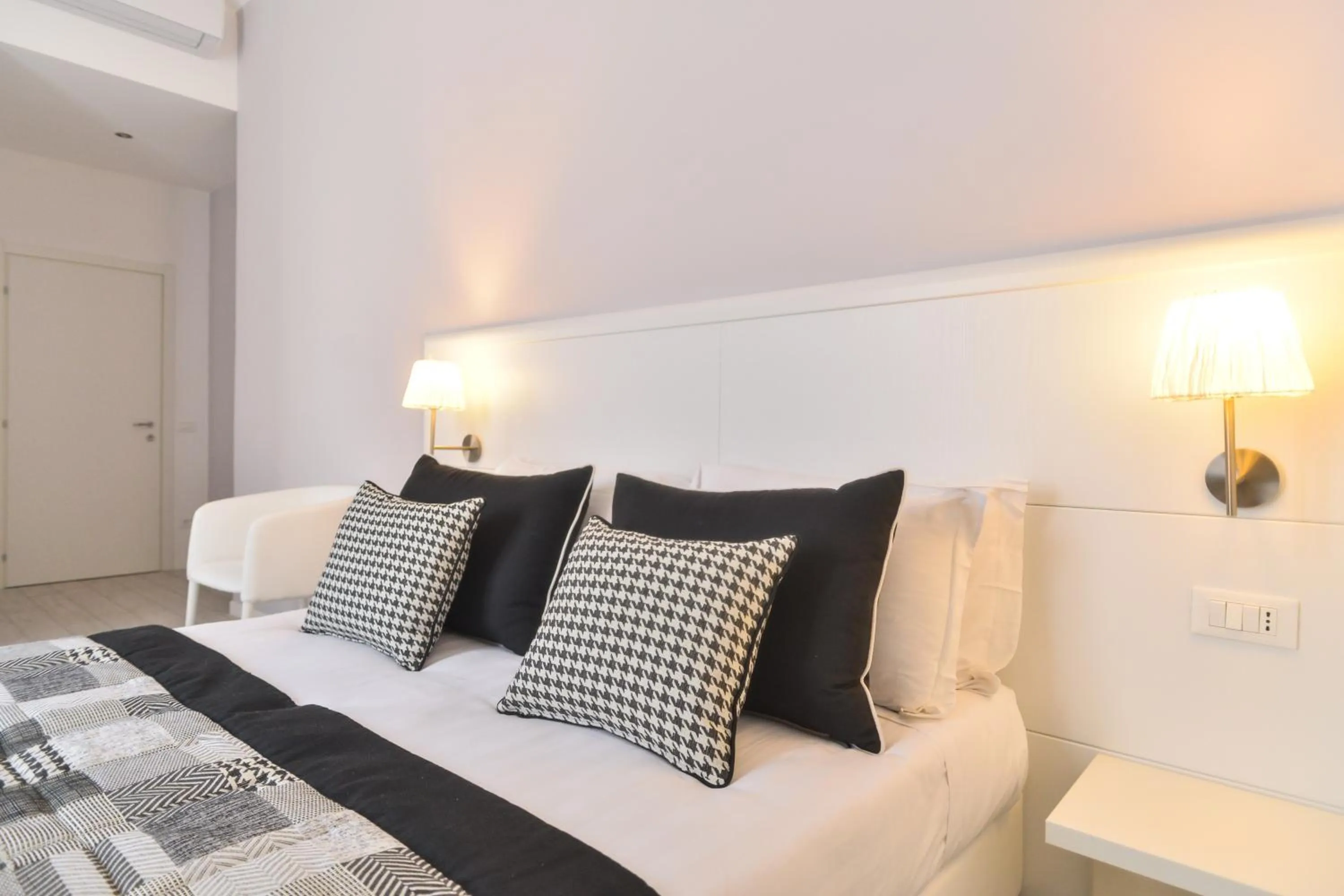 Bed in Lata Luxury Rooms