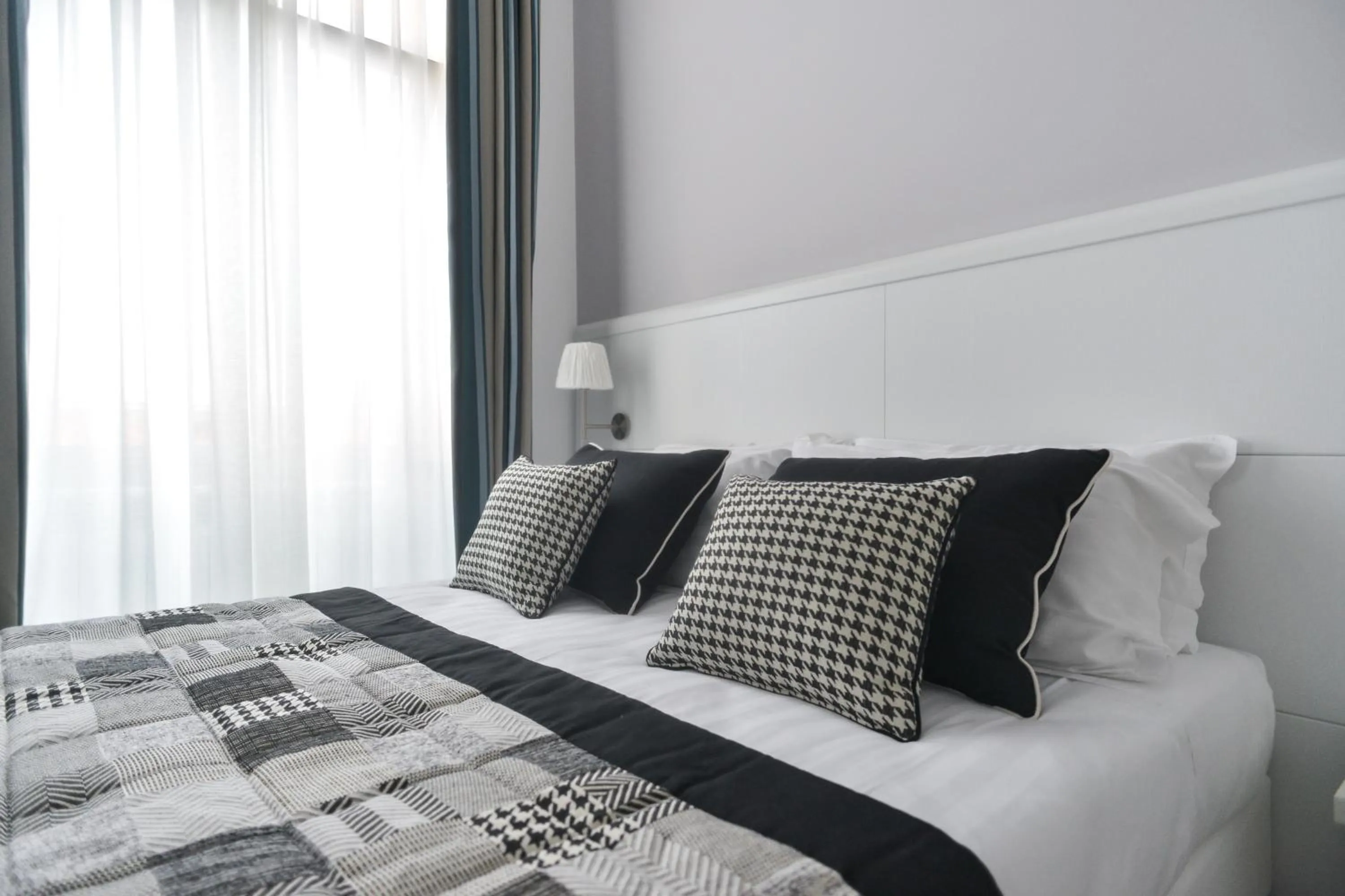 Bed in Lata Luxury Rooms