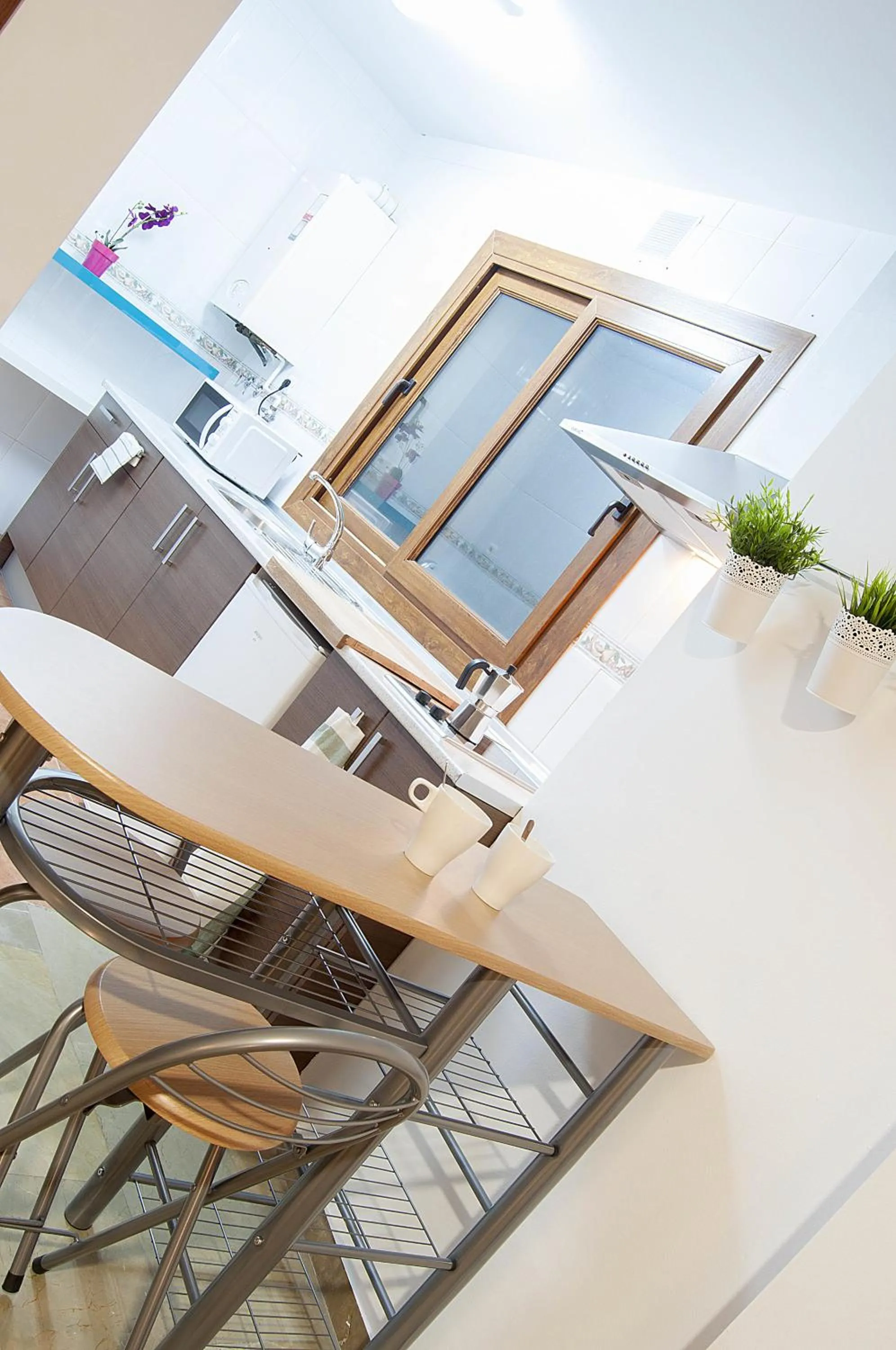 Kitchen or kitchenette in Apartamentos Catedral Plaza 3000