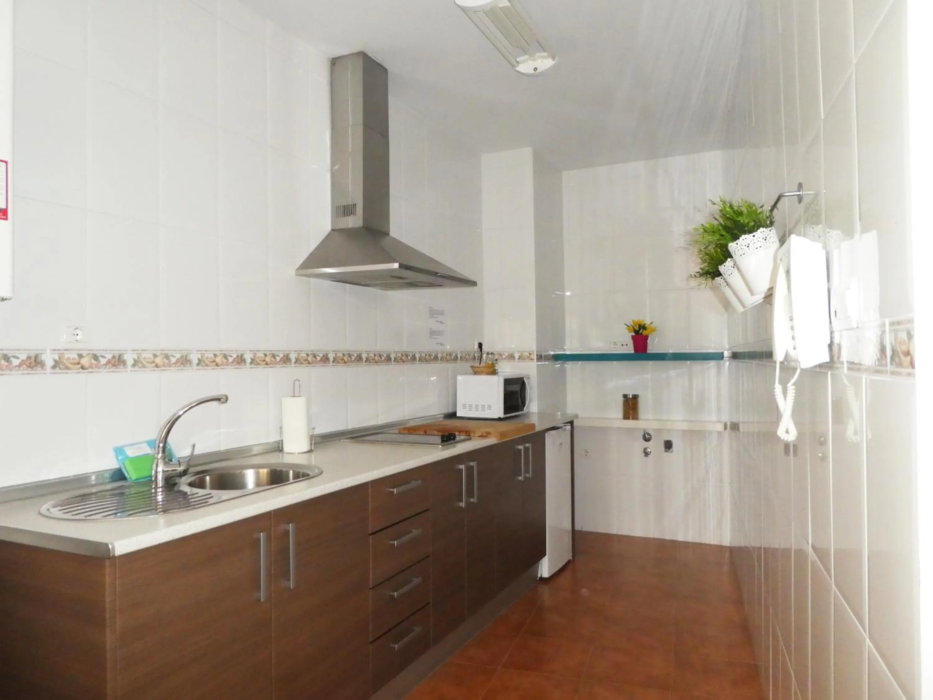 Kitchen or kitchenette in Apartamentos Catedral Plaza 3000