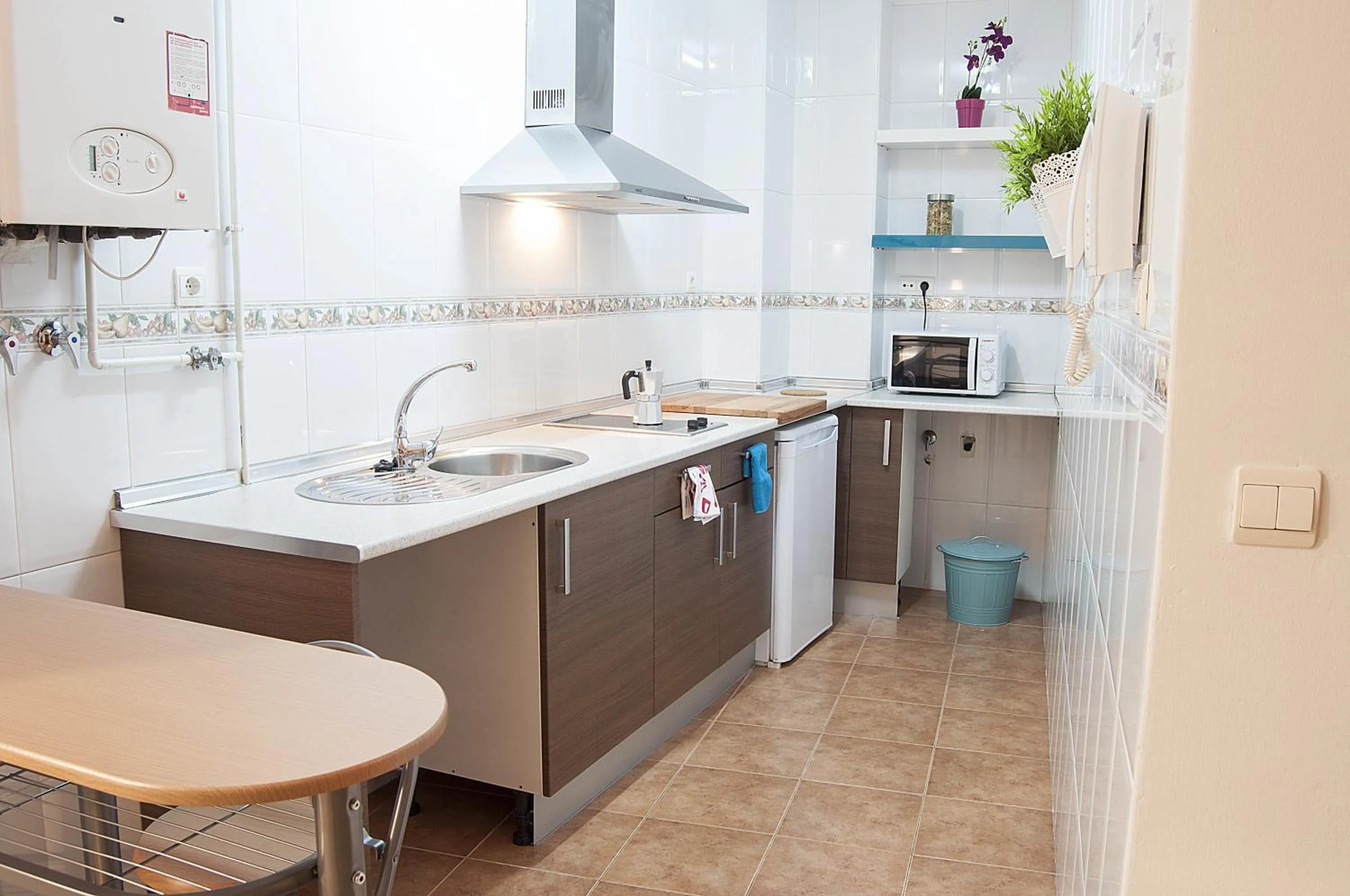 Kitchen or kitchenette in Apartamentos Catedral Plaza 3000