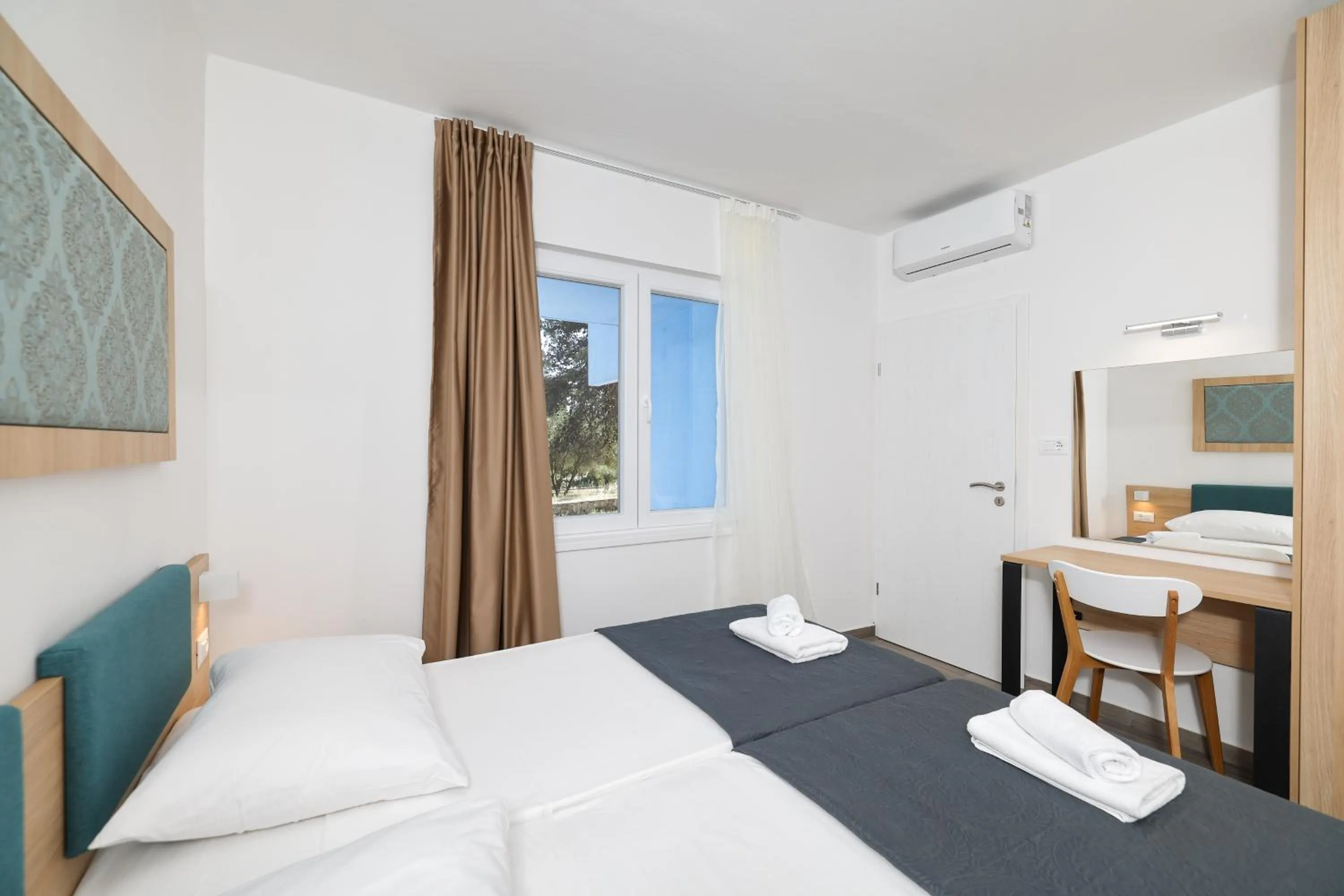 Bed in Apartments Medena