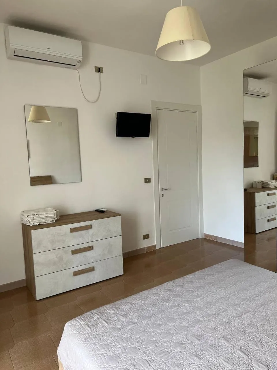 Bedroom in Le Grotte B&B