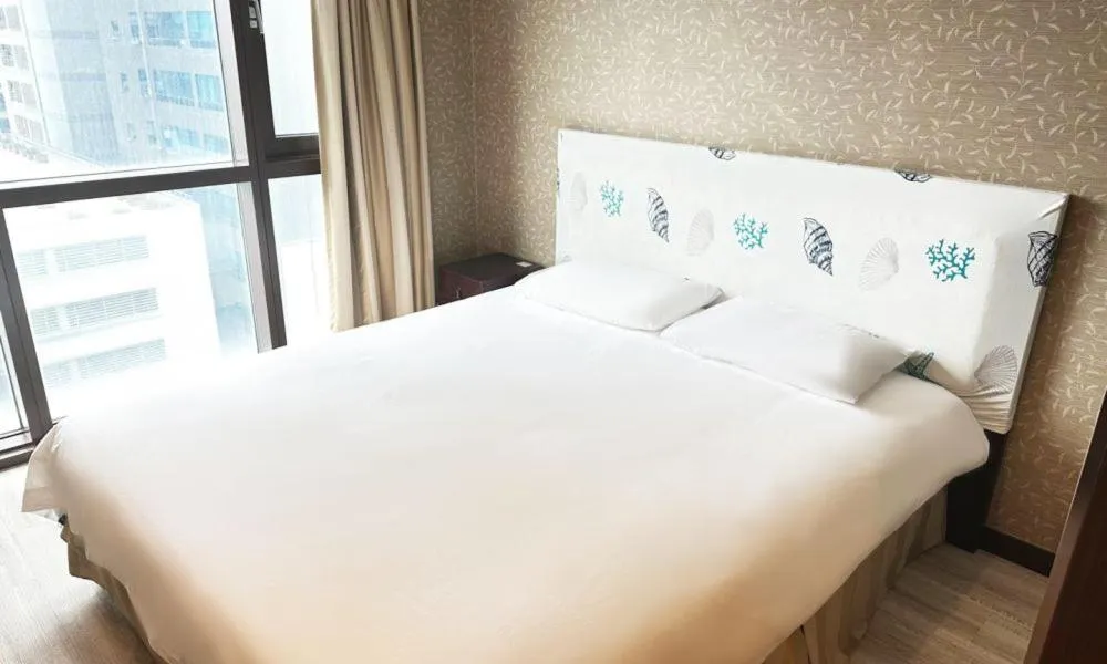 Bed in Centum City Hotel