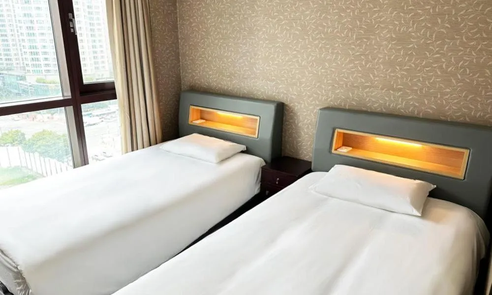 Bed in Centum City Hotel
