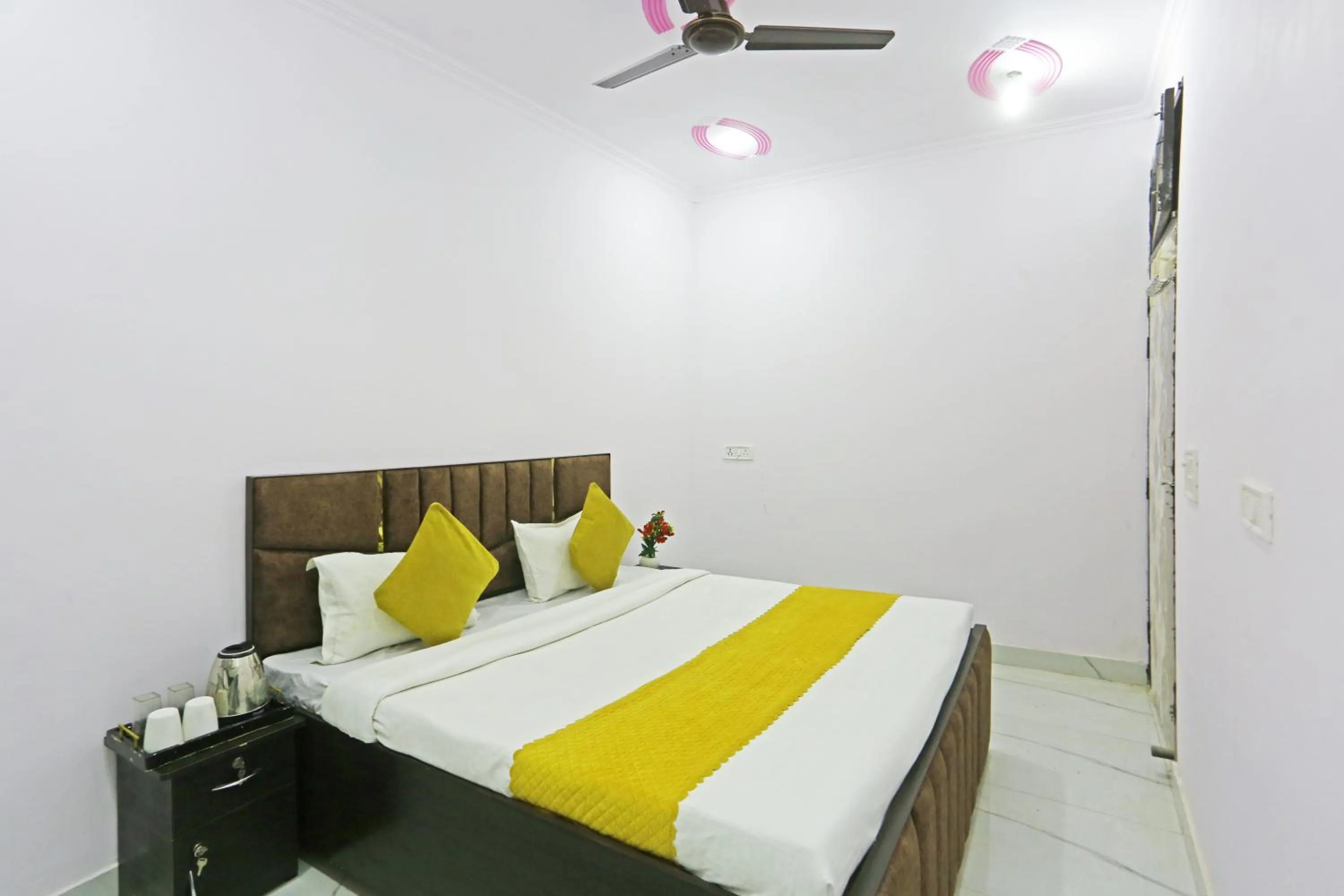 Bed in Twamev Residency