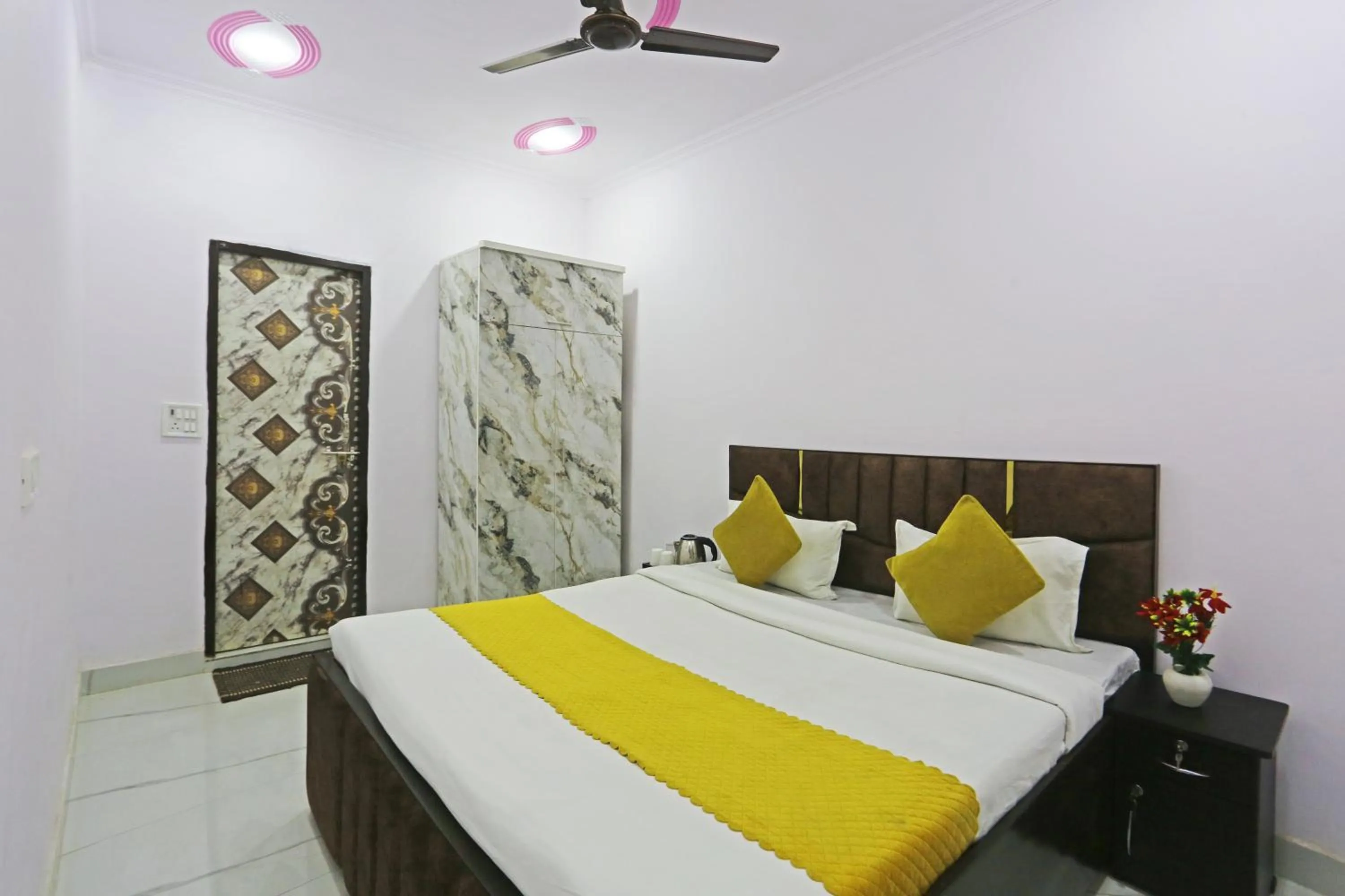 Bed in Twamev Residency