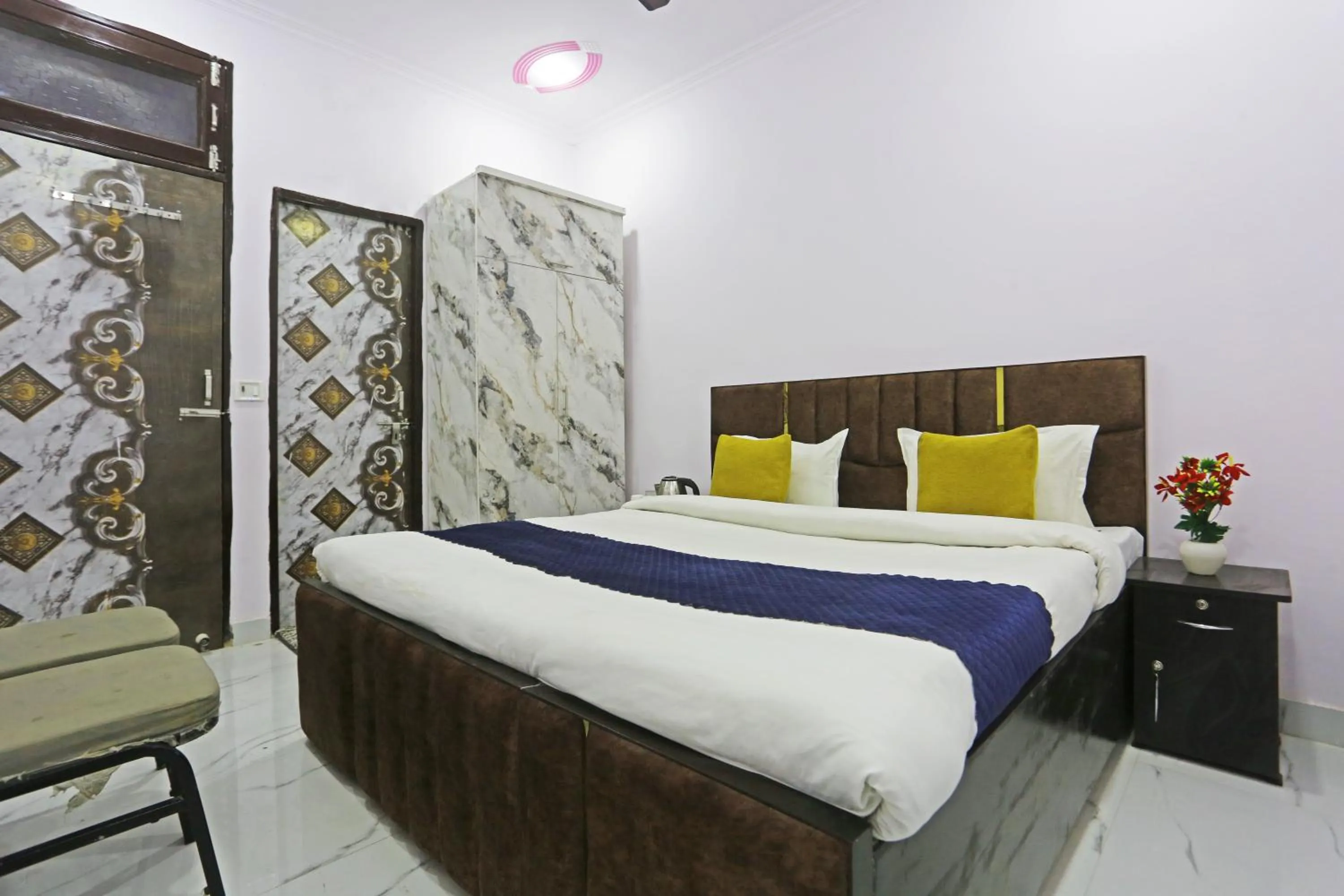 Bed in Twamev Residency