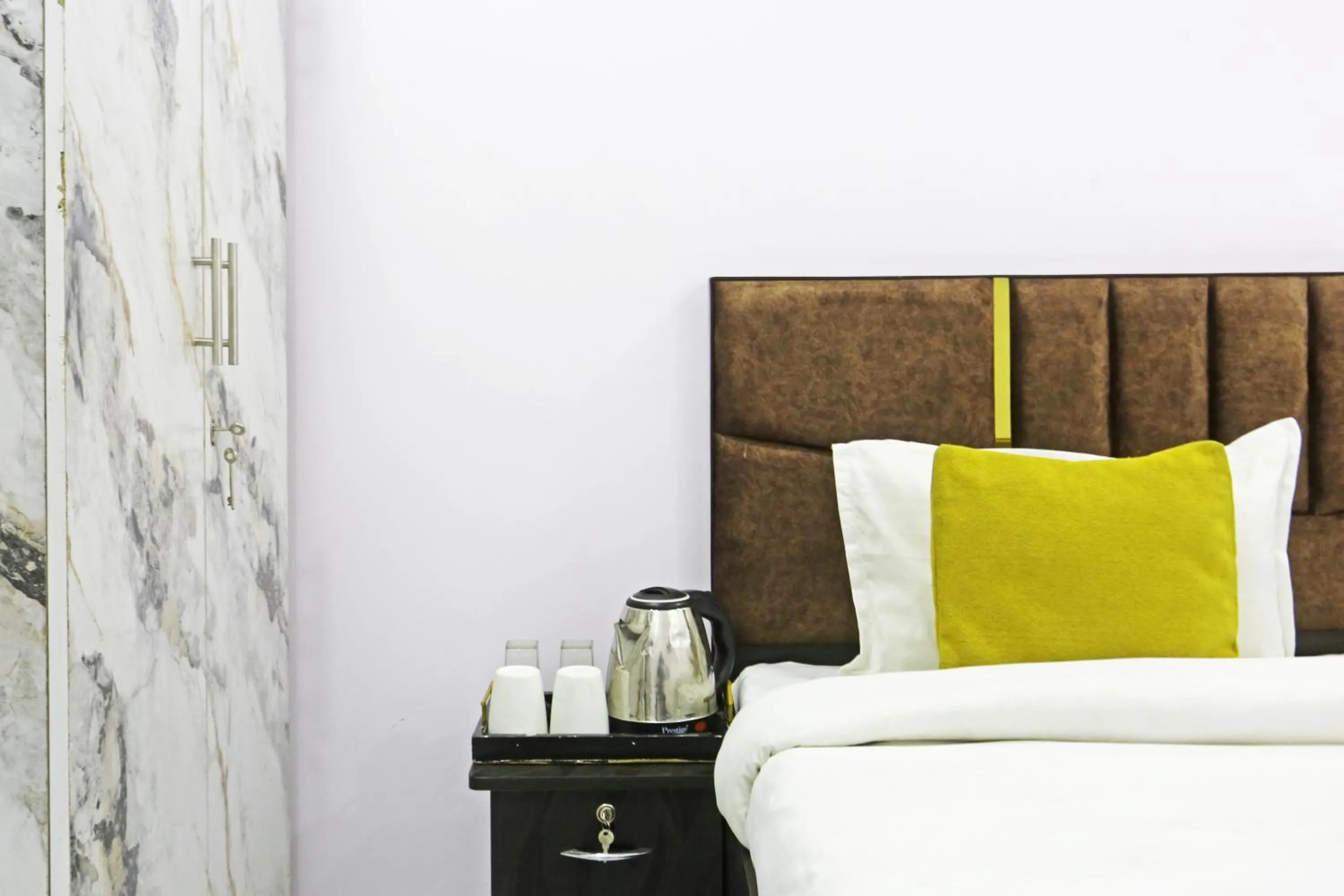 Bed in Twamev Residency