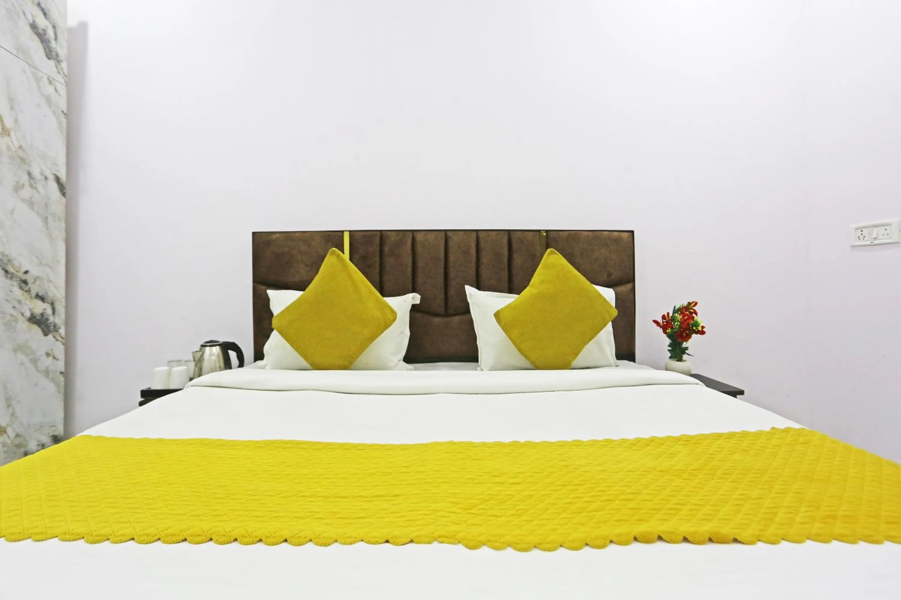 Bed in Twamev Residency
