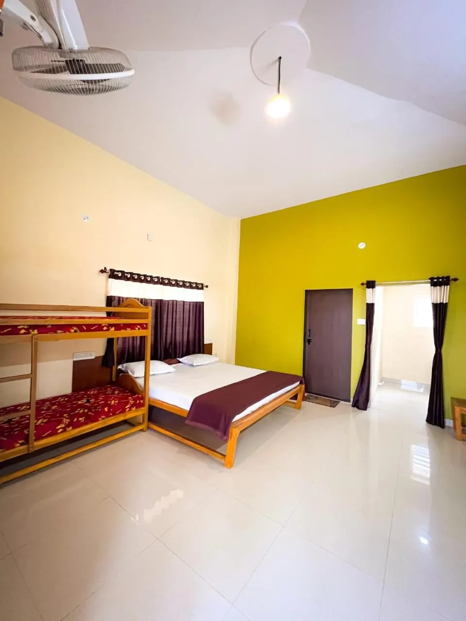 Photo of the whole room, Bed in Madhura Agro Tourism