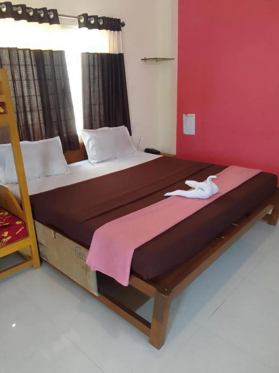 Bed in Madhura Agro Tourism