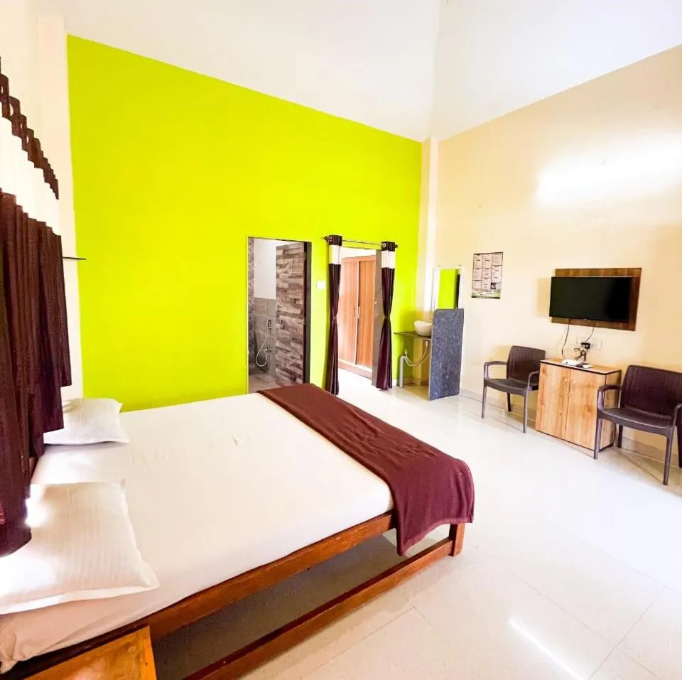 Bed in Madhura Agro Tourism