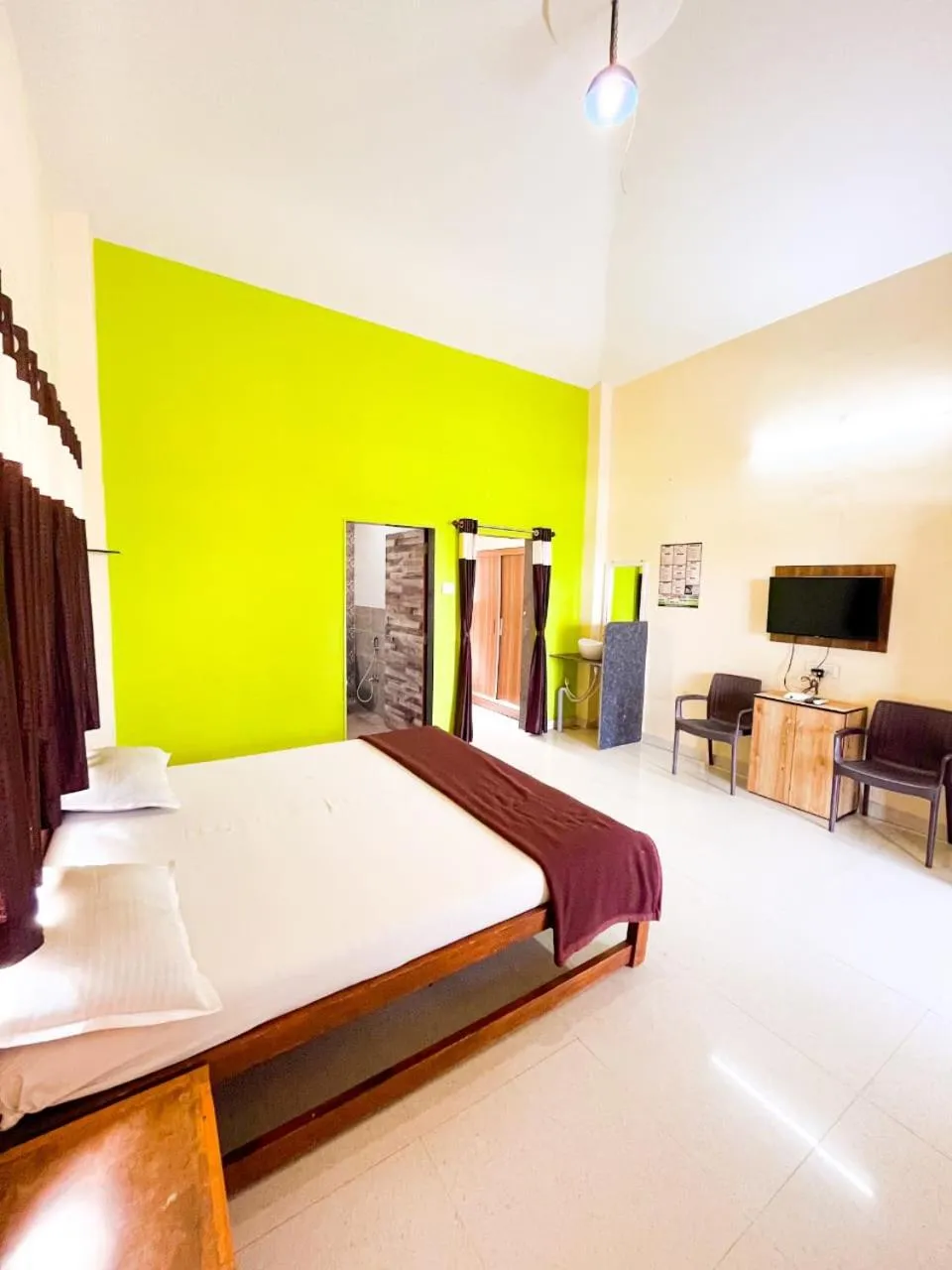 Bed in Madhura Agro Tourism