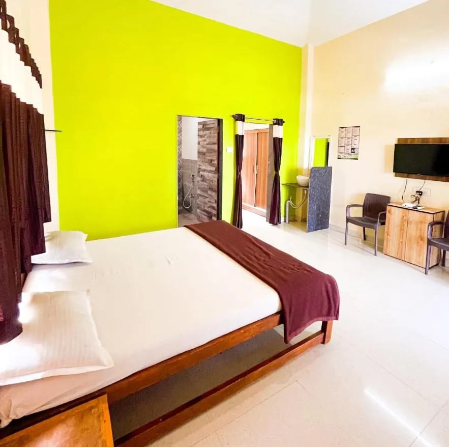 Bed in Madhura Agro Tourism