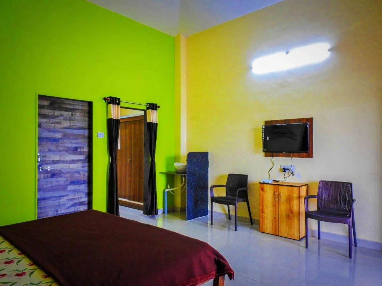 Living room, Bed in Madhura Agro Tourism