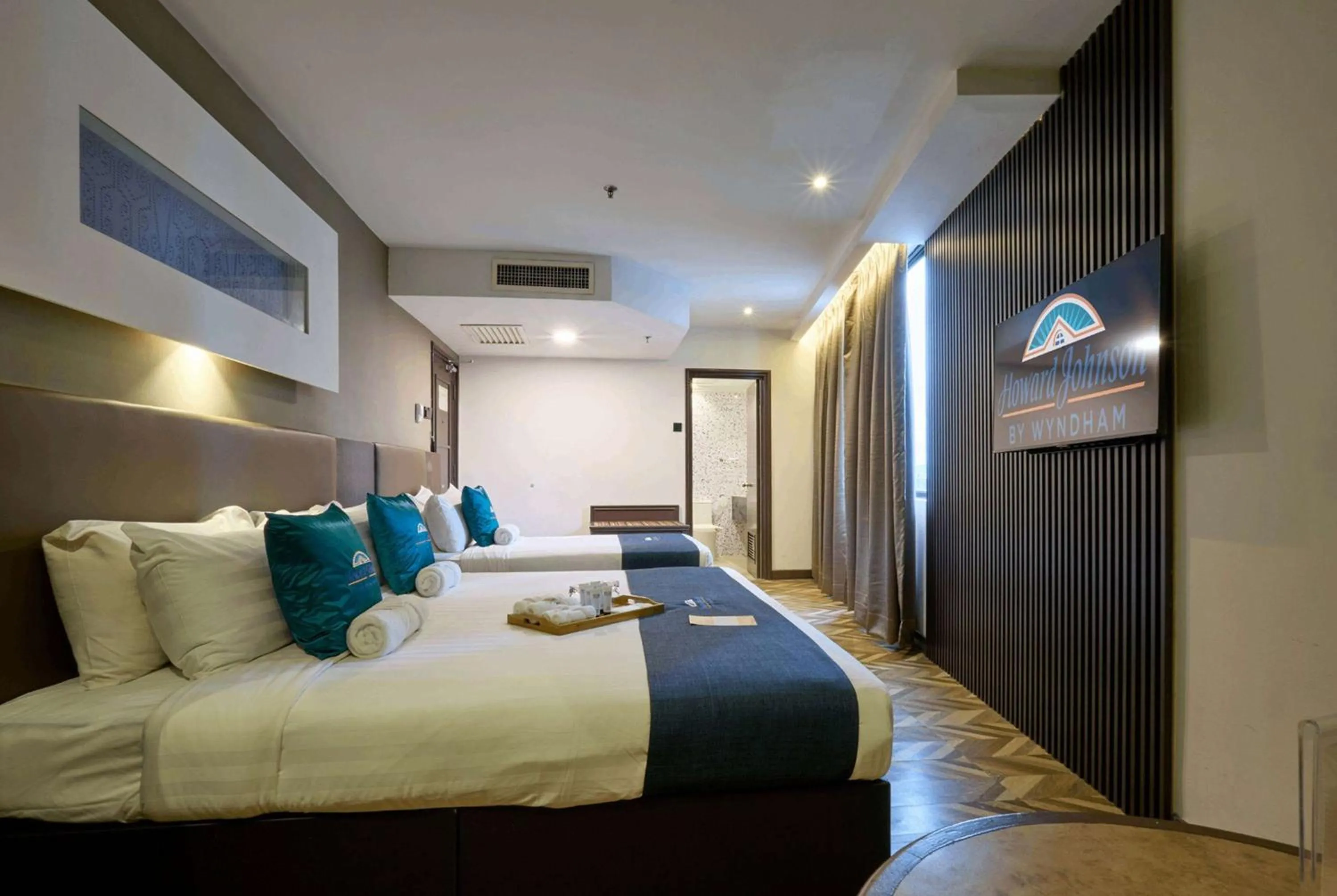 Photo of the whole room, Bed in Howard Johnson By Wyndham Kuala Lumpur 118