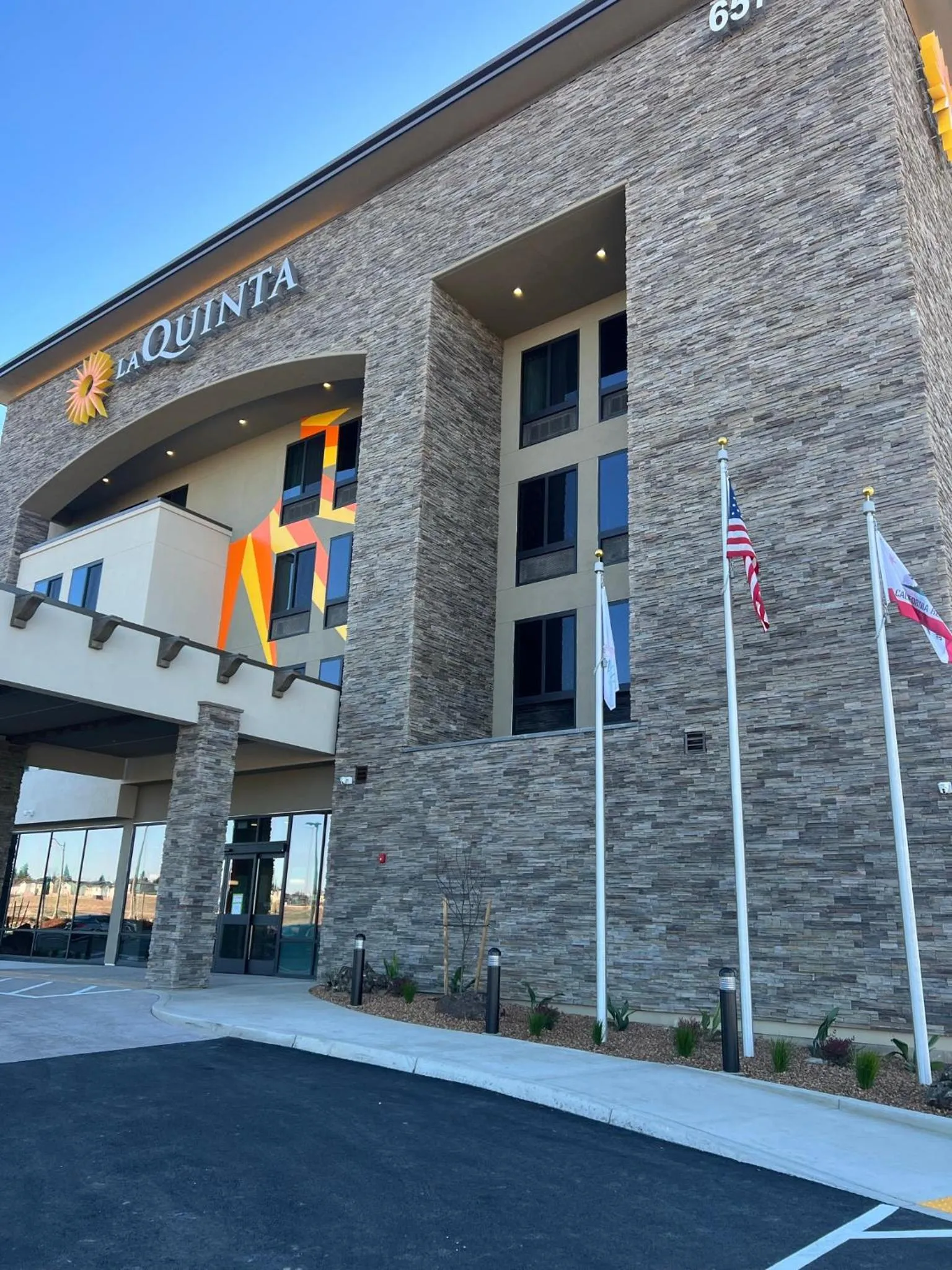 Property building in La Quinta Inn and Suites by Wyndham Lincoln