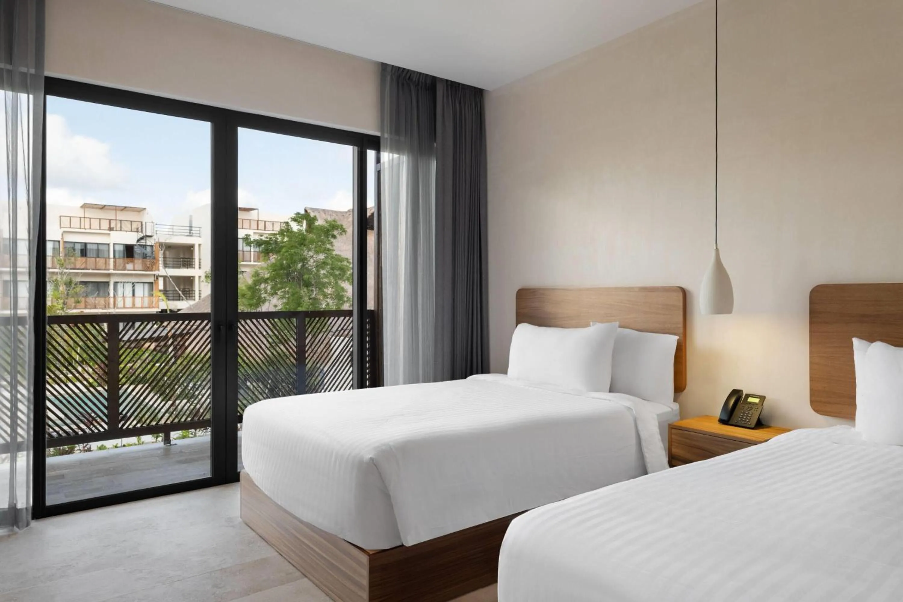 Photo of the whole room, Bed in Wyndham Tulum