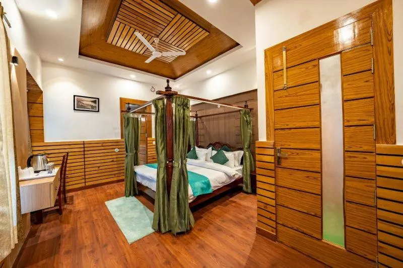 Bed in Aamari Resort