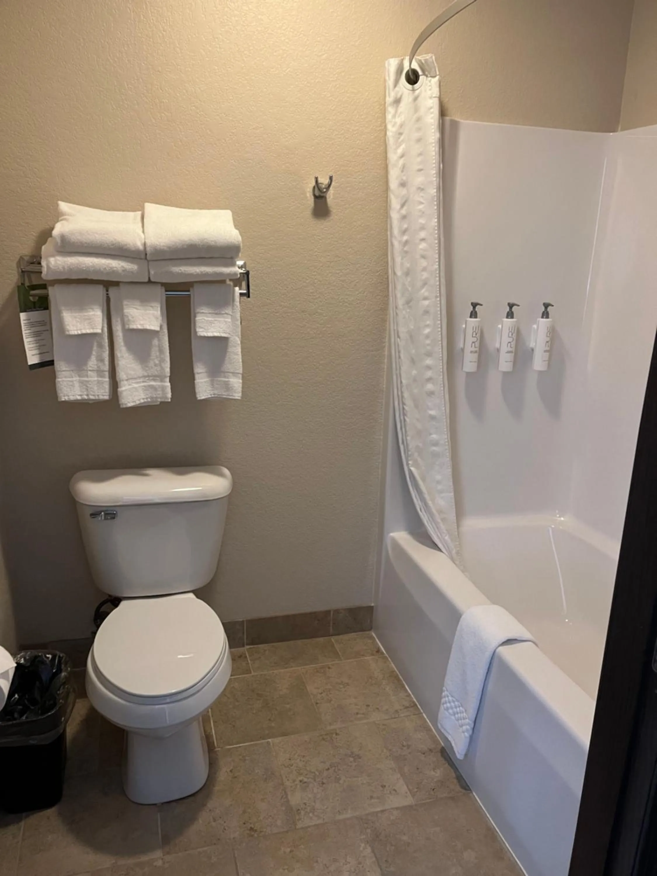 Bathroom in Cobblestone Inn & Suites - Denison | Oak Ridge