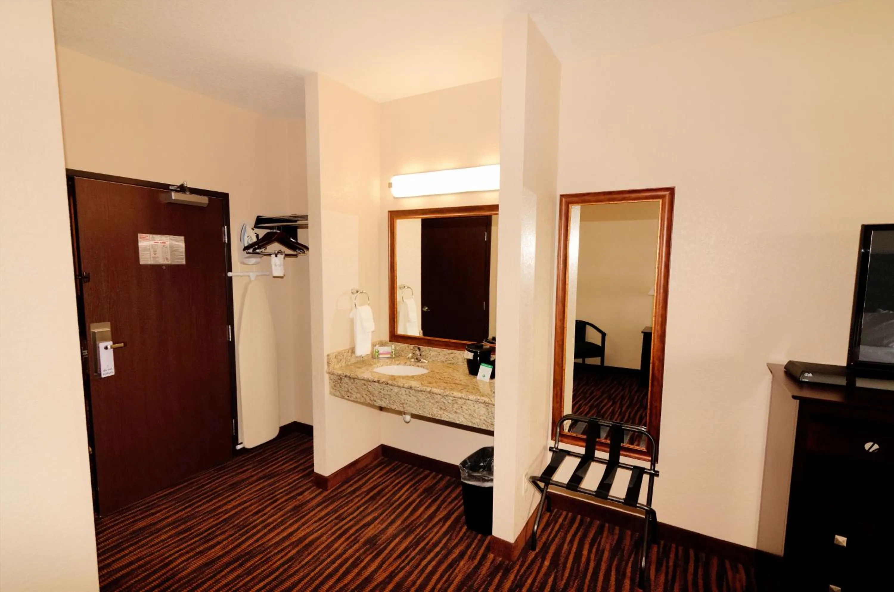 Bathroom in Cobblestone Inn & Suites - Denison | Oak Ridge