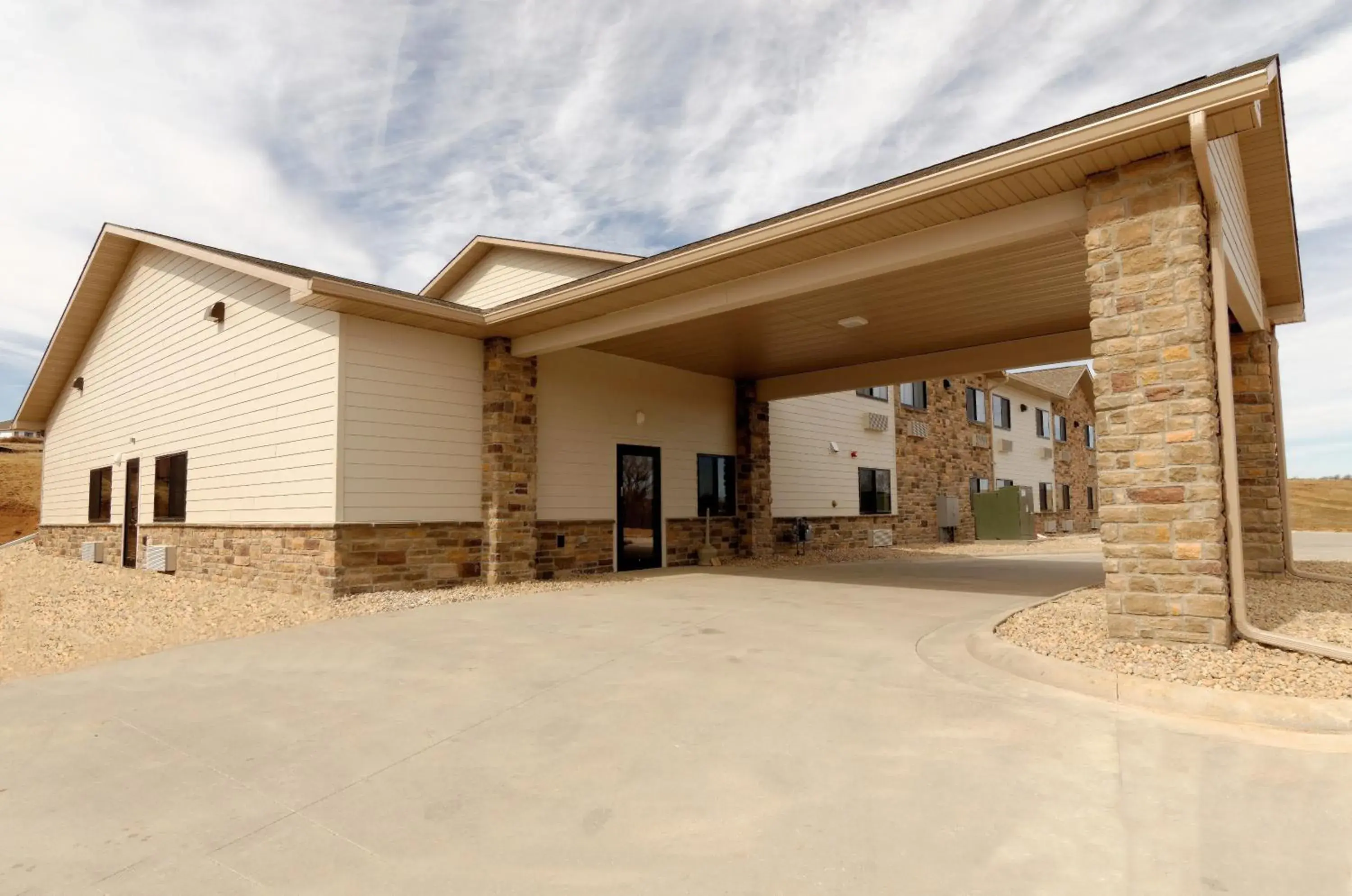Property building in Cobblestone Inn & Suites - Denison | Oak Ridge Property building in Cobblestone Inn & Suites - Denison | Oak Ridge