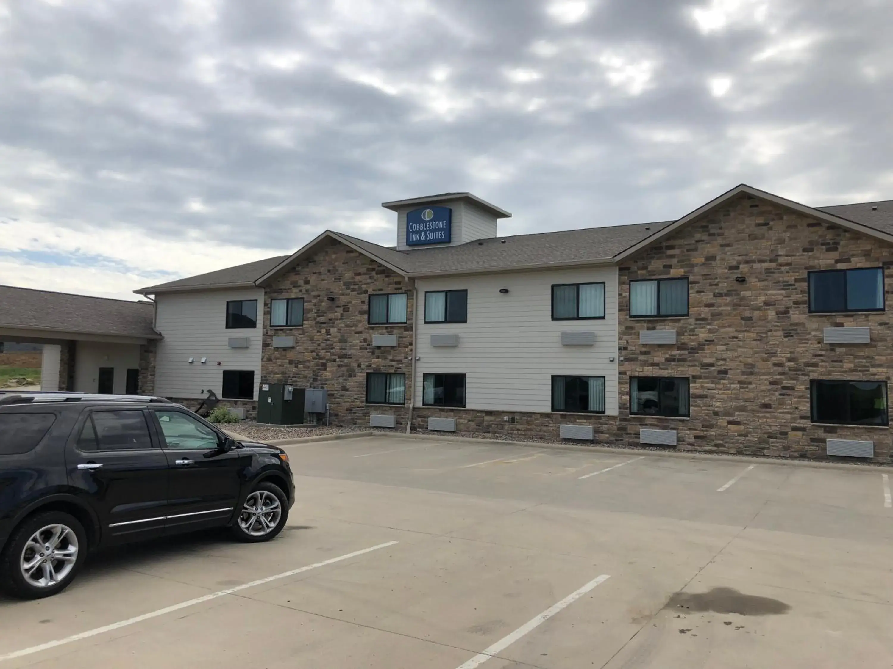 Property building in Cobblestone Inn & Suites - Denison | Oak Ridge Property building in Cobblestone Inn & Suites - Denison | Oak Ridge