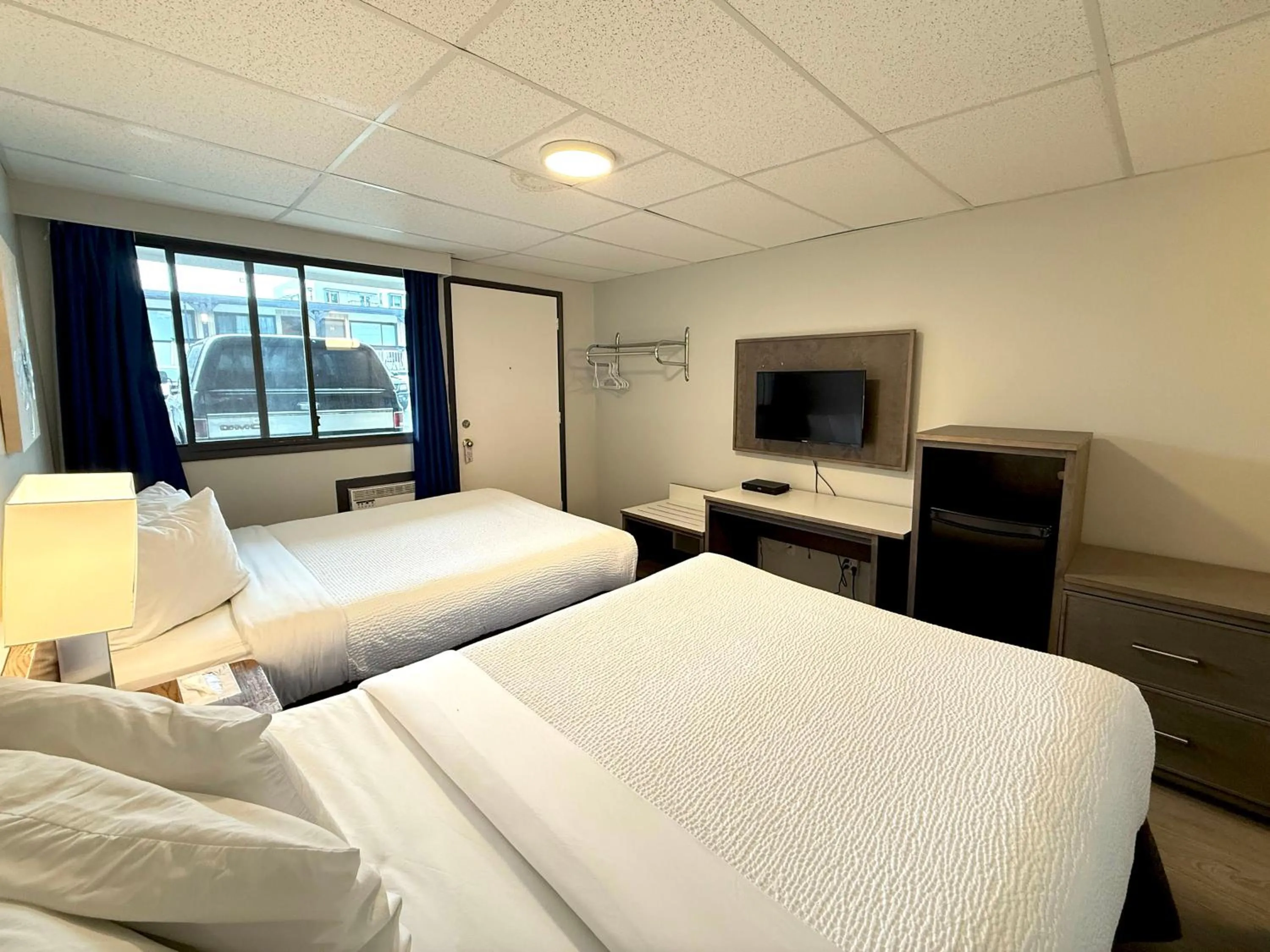 Bed in Departure Bay Motel