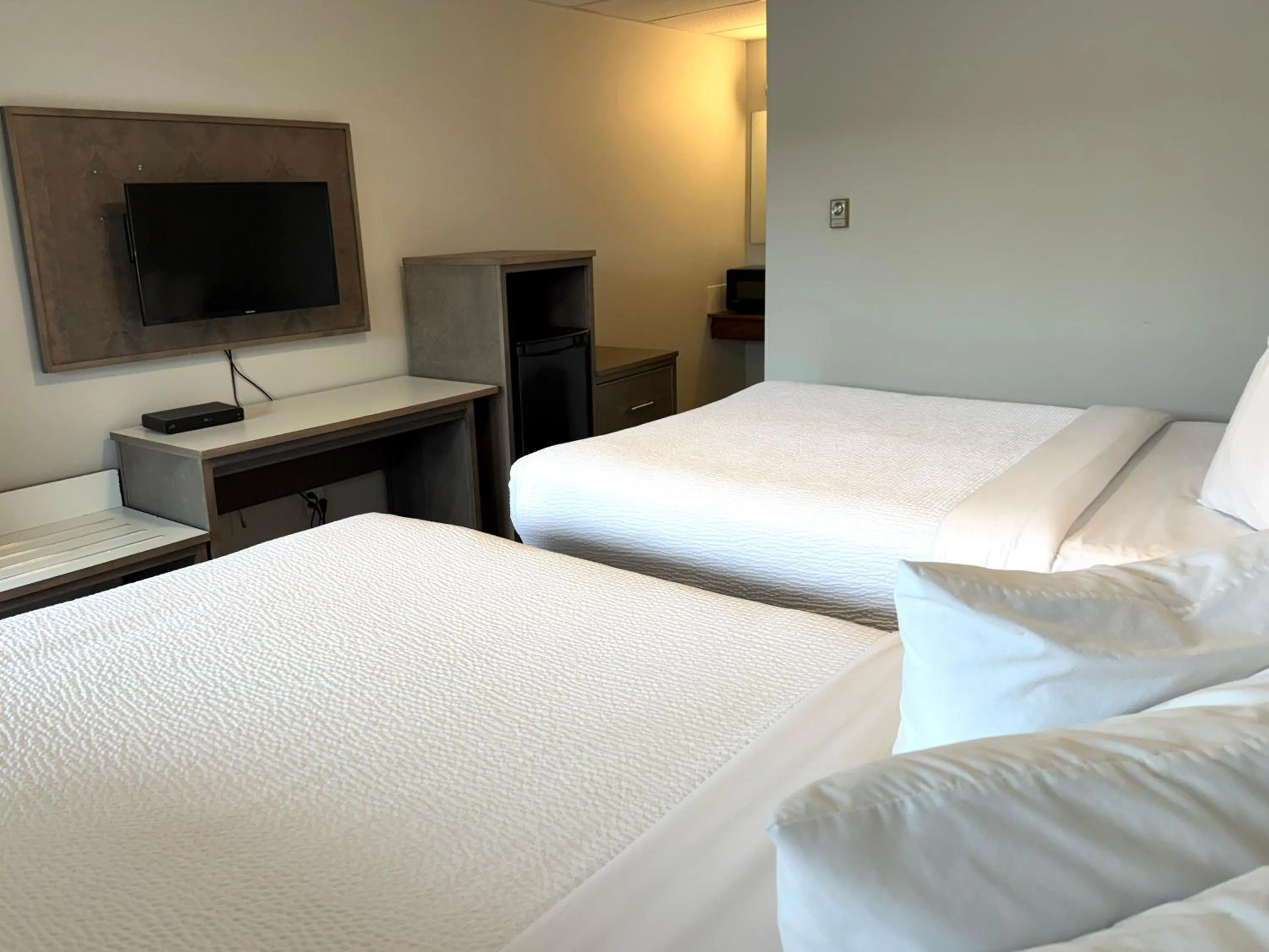 Bed in Departure Bay Motel