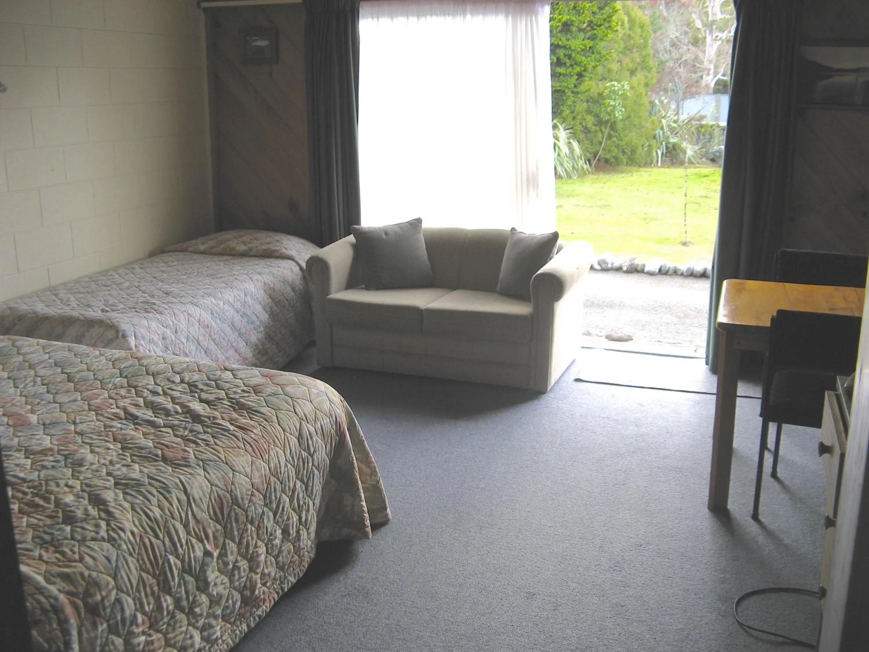 Bed in Tongariro River Motel