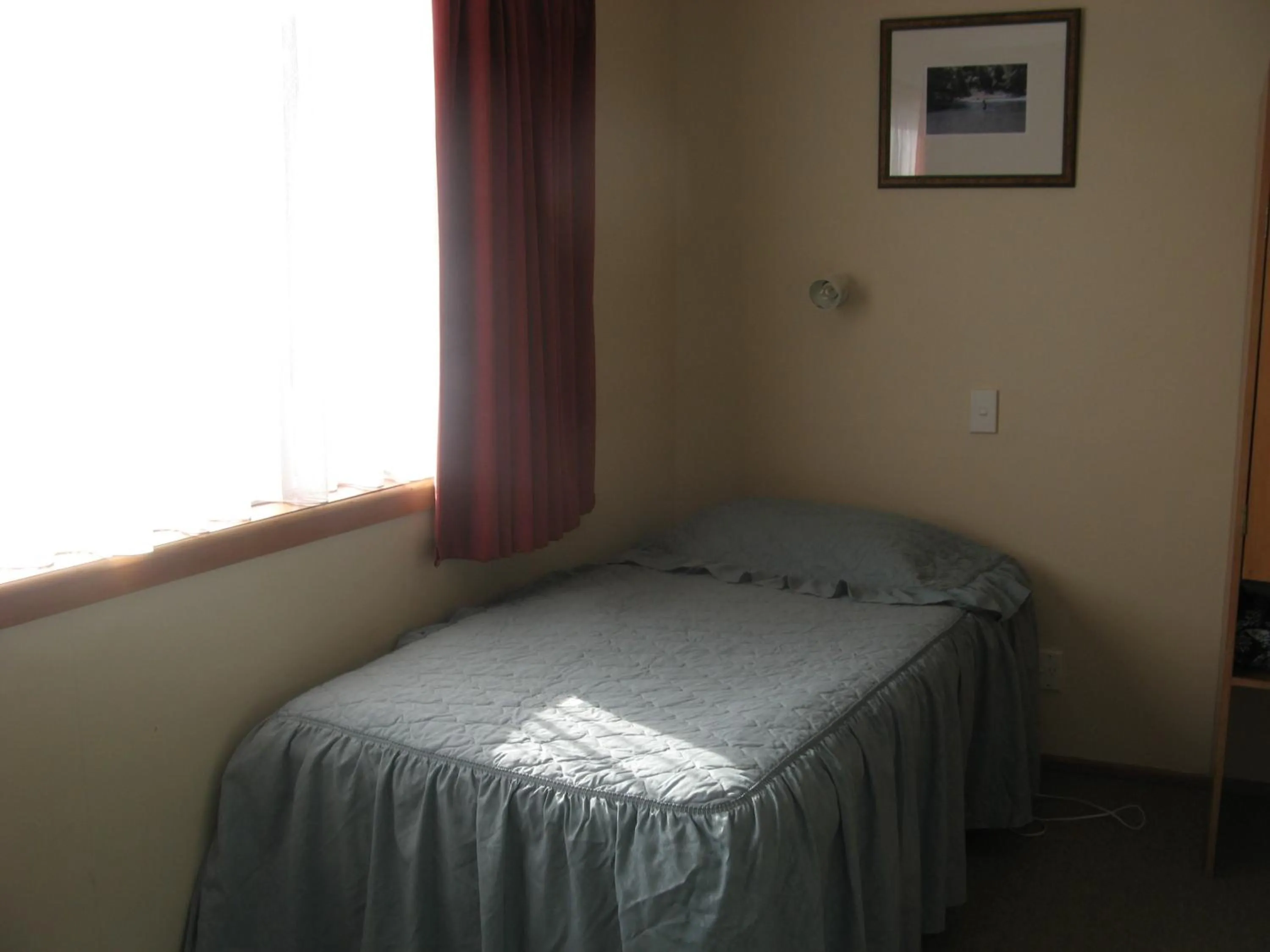 Bed in Tongariro River Motel