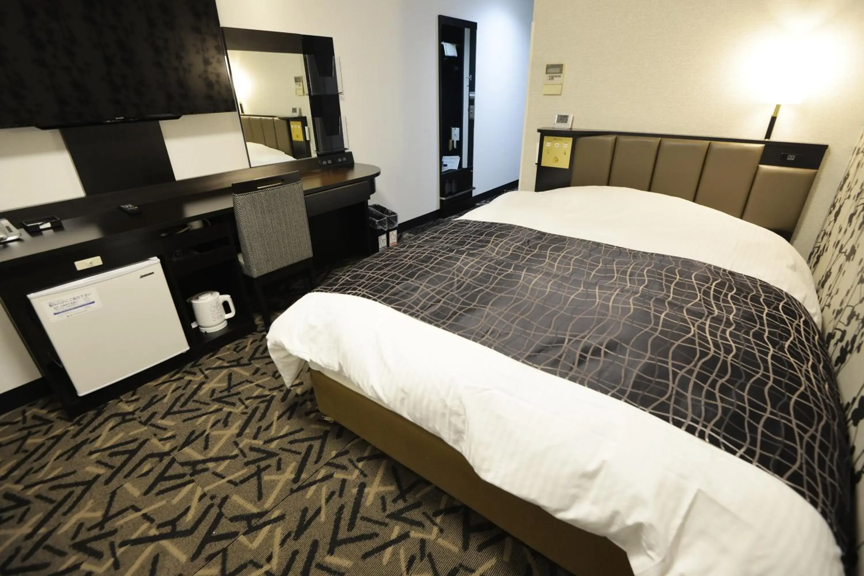 Bed in APA Hotel Mie Kameyama Bed in APA Hotel Mie Kameyama