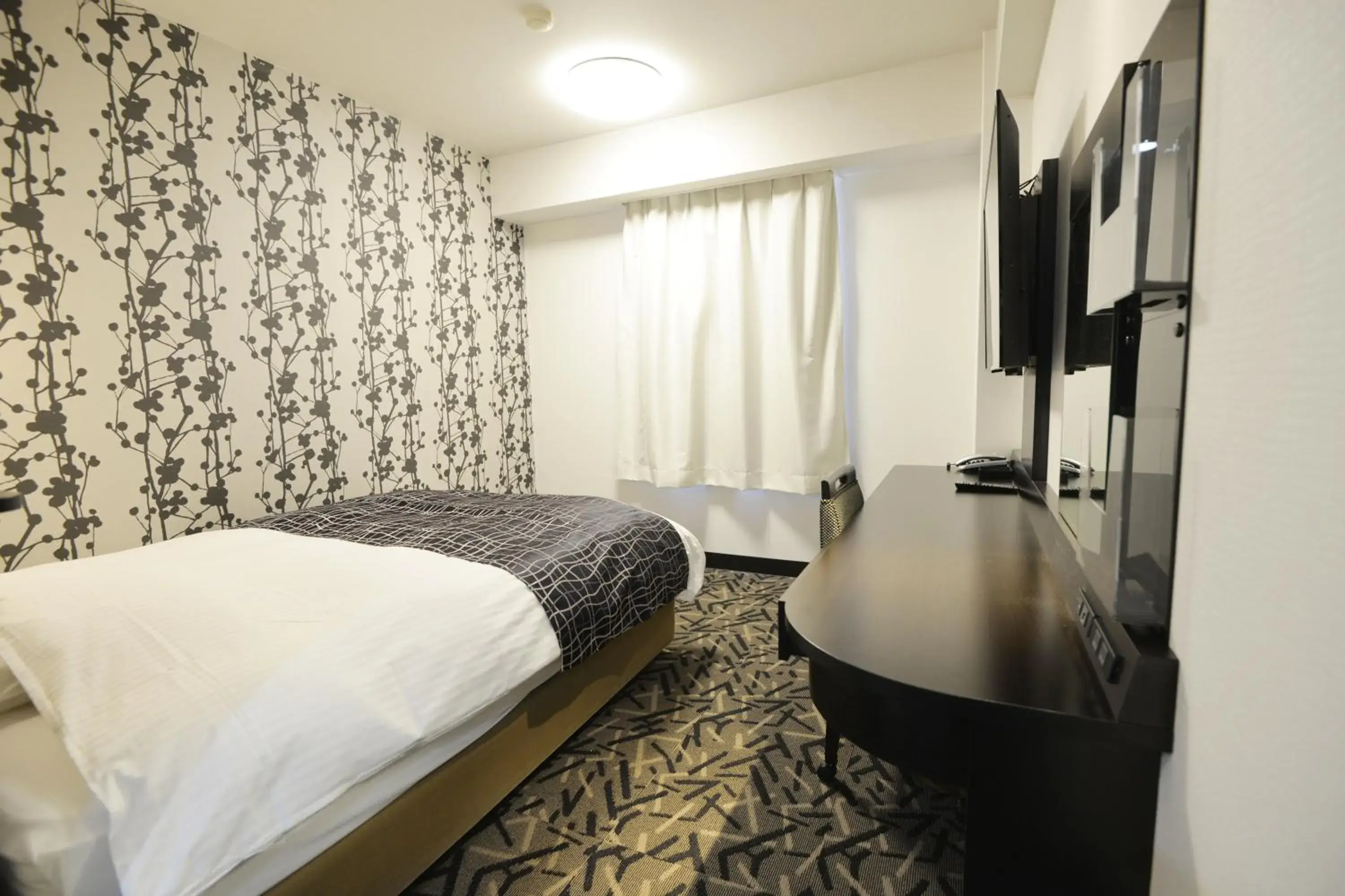 Bed in APA Hotel Mie Kameyama Bed in APA Hotel Mie Kameyama