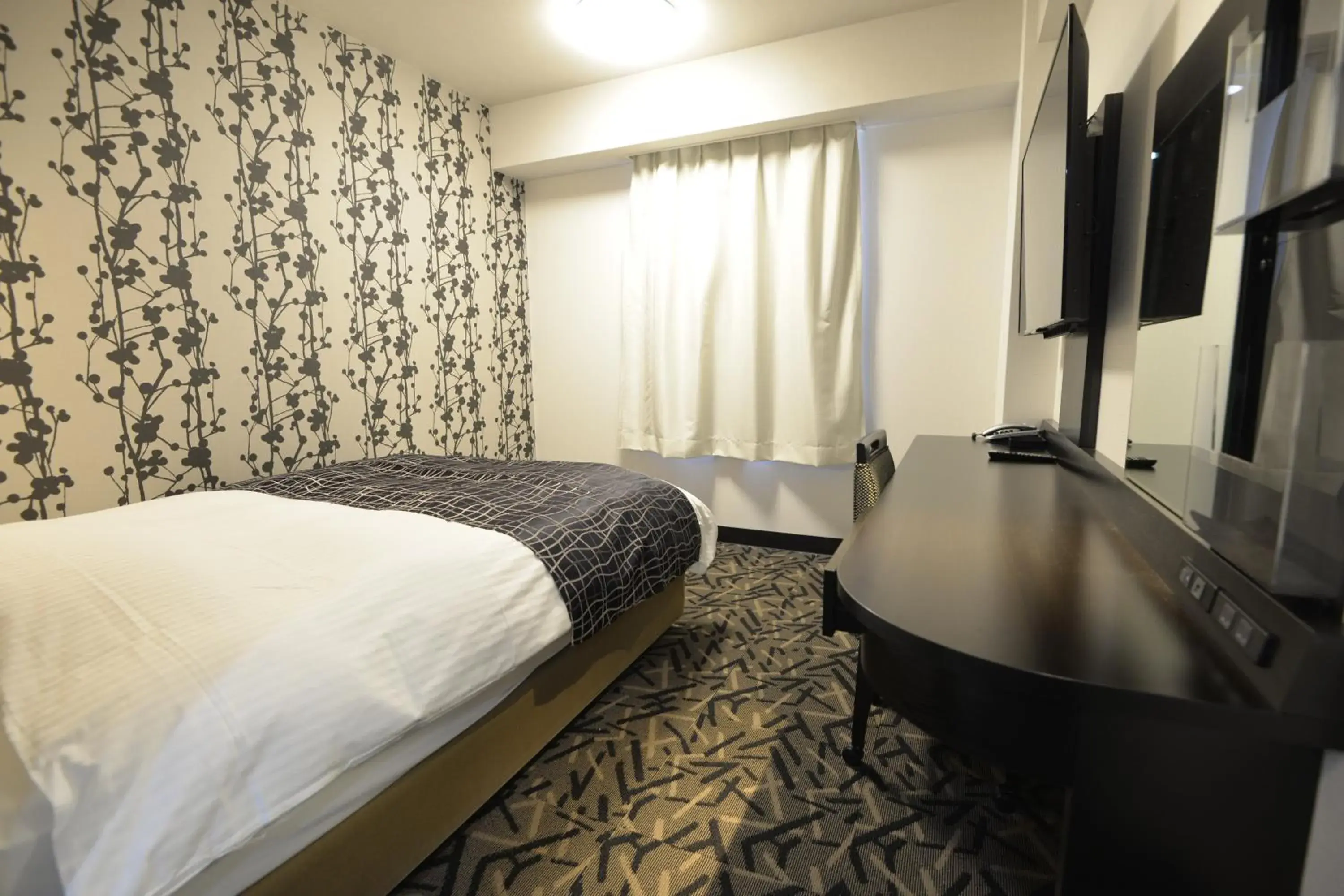 Bed in APA Hotel Mie Kameyama Bed in APA Hotel Mie Kameyama