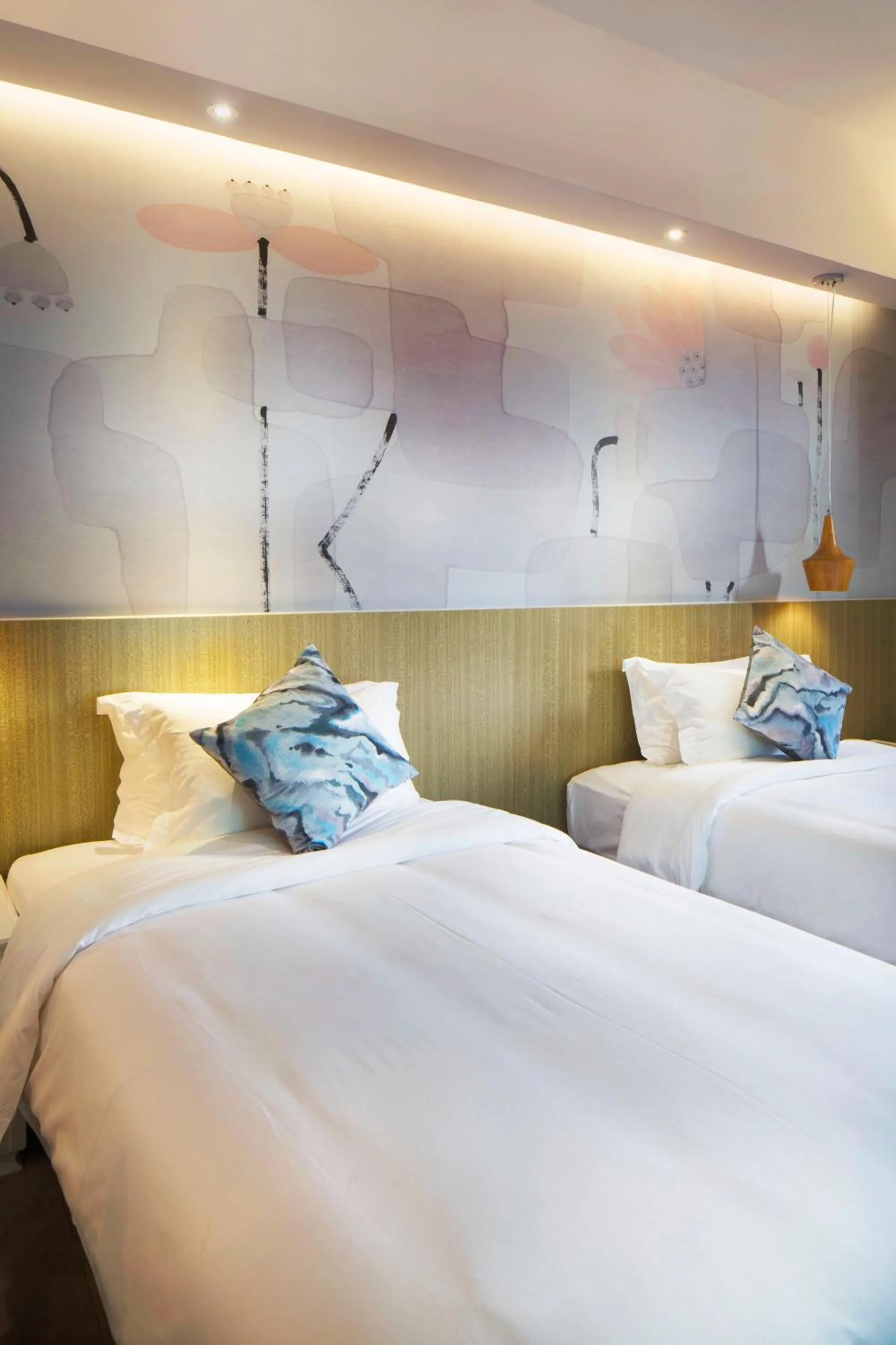 Bed in Paco Hotel Tianpingjia Metro Guangzhou