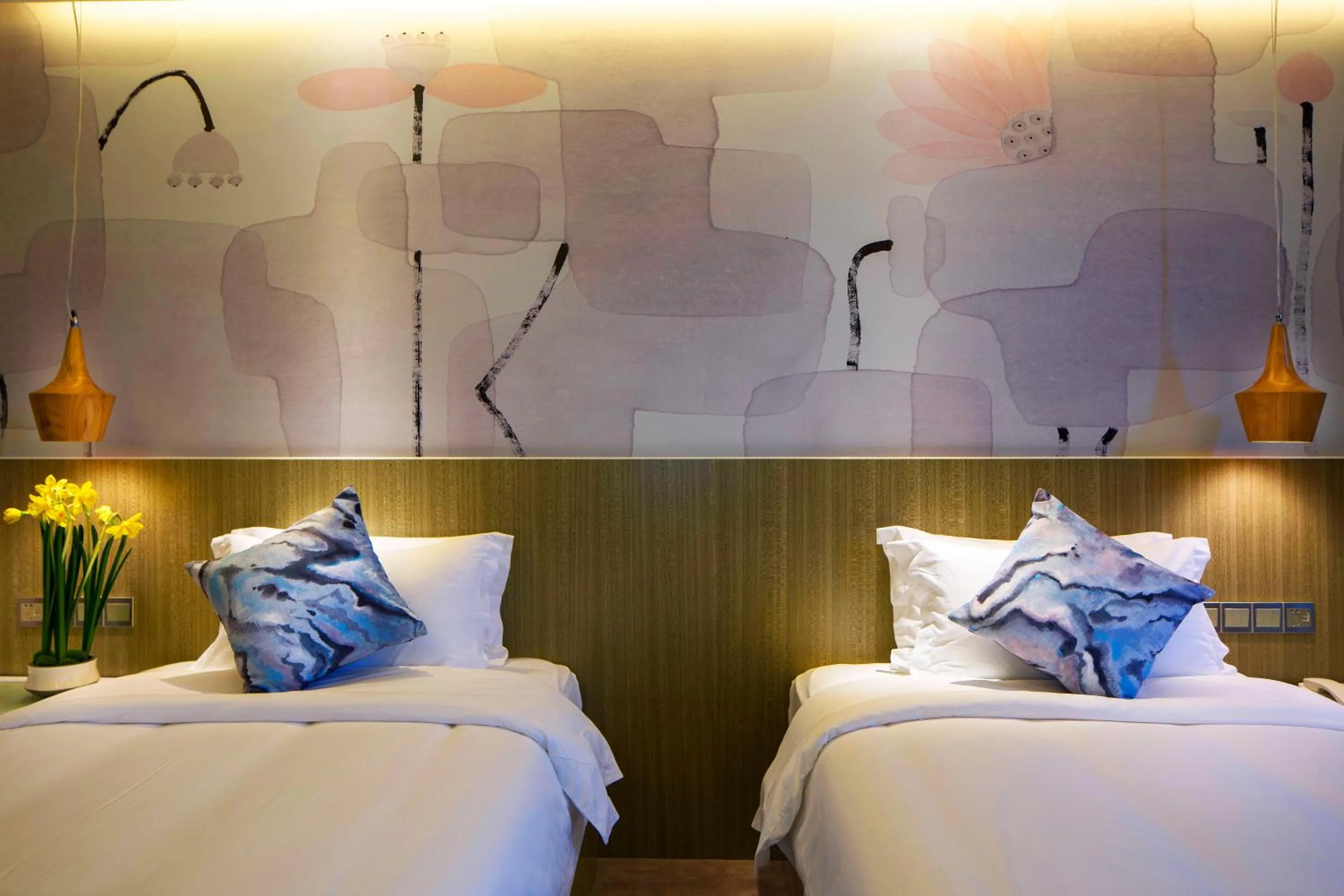 Bed in Paco Hotel Tianpingjia Metro Guangzhou