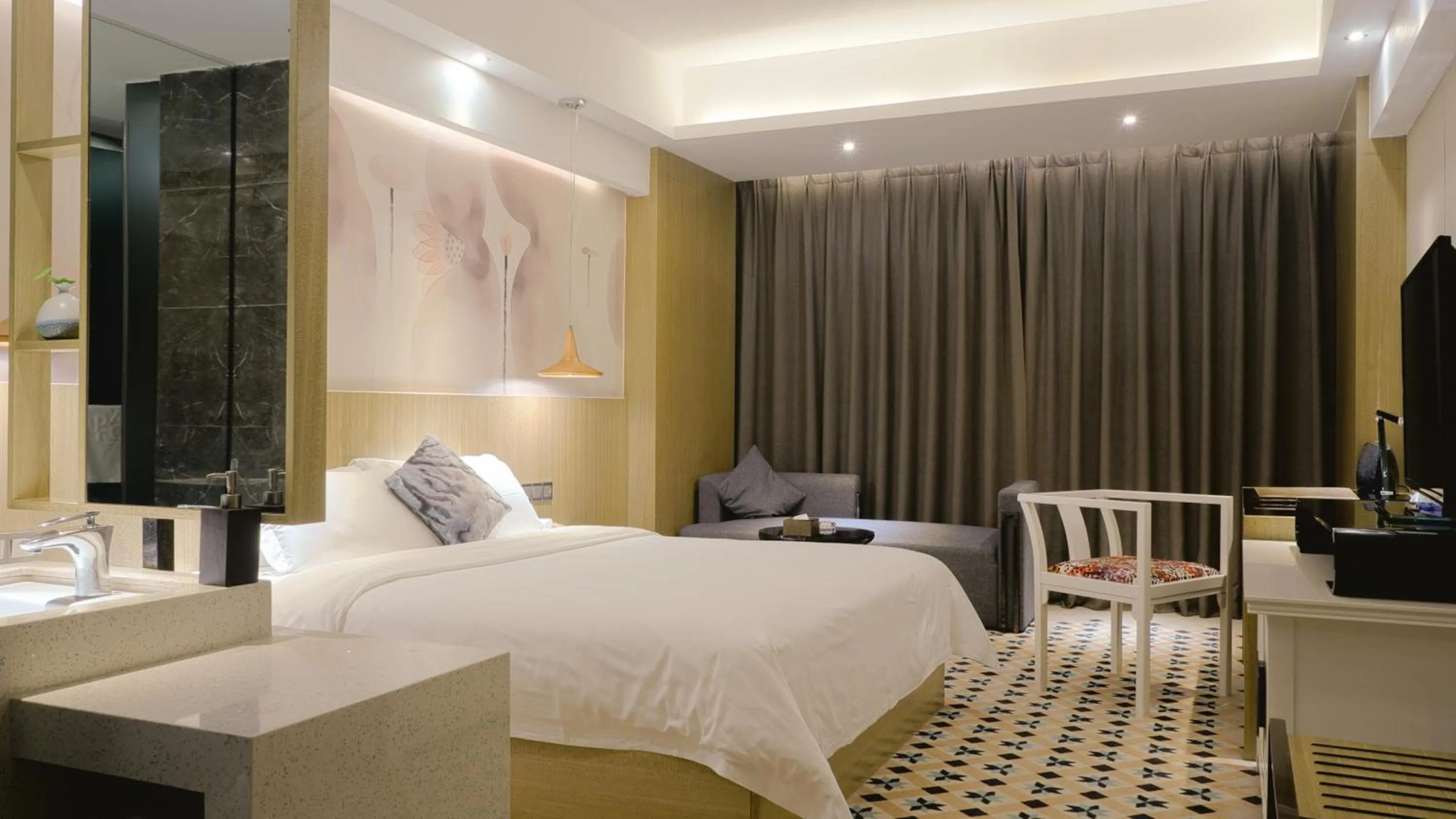 Bed in Paco Hotel Tianpingjia Metro Guangzhou