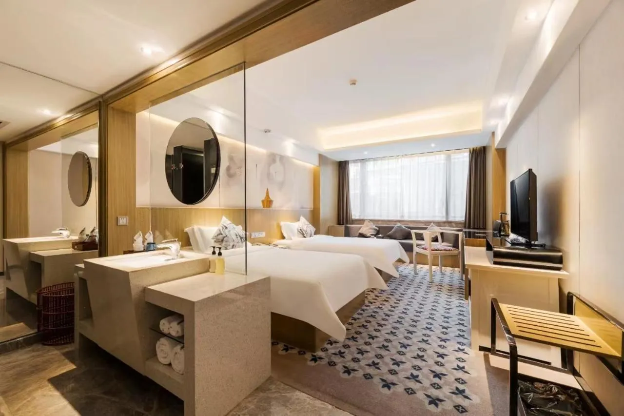 Bed in Paco Hotel Tianpingjia Metro Guangzhou