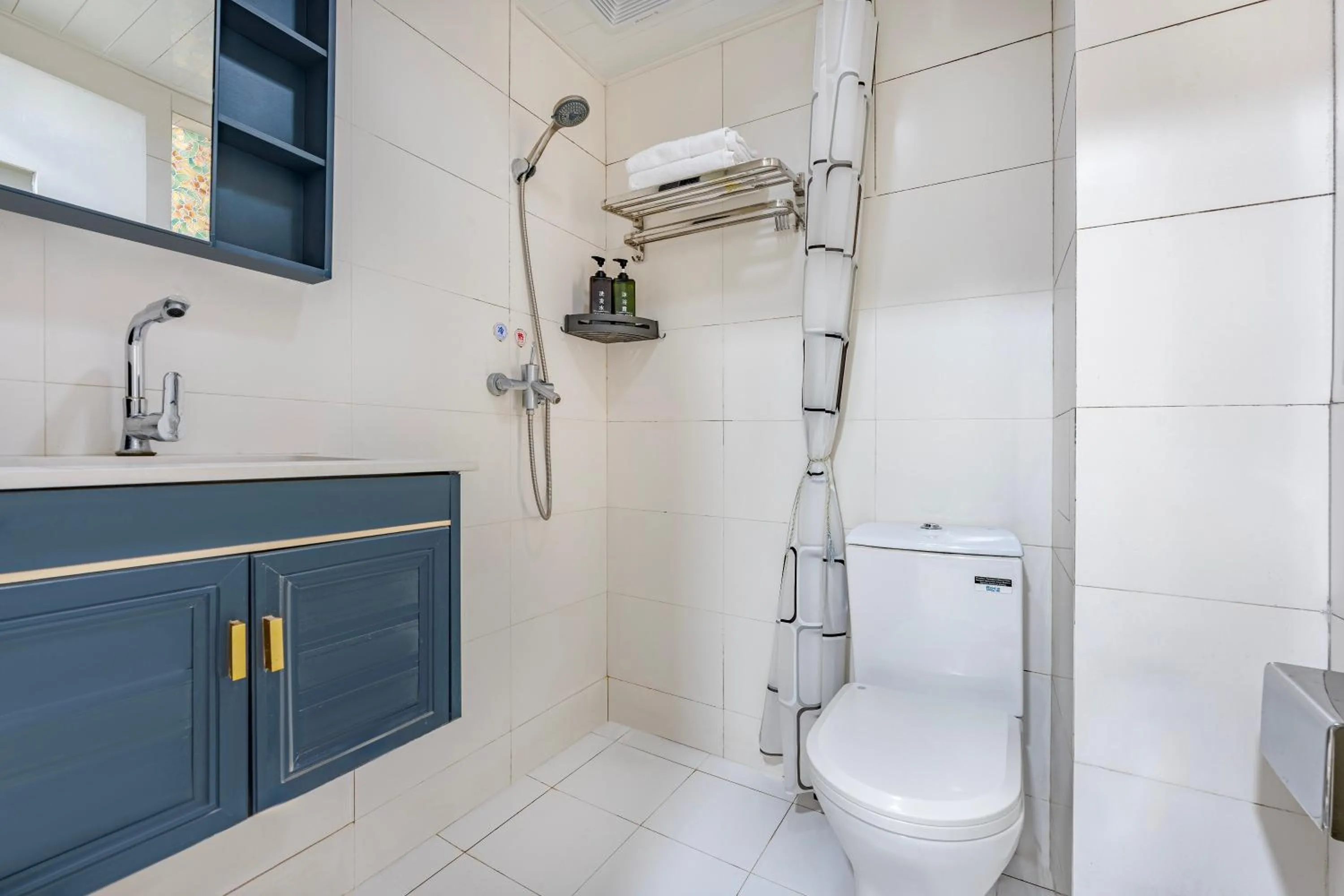 Toilet in Meiru Apartment Hotel Guangzhou Bolin Apartment