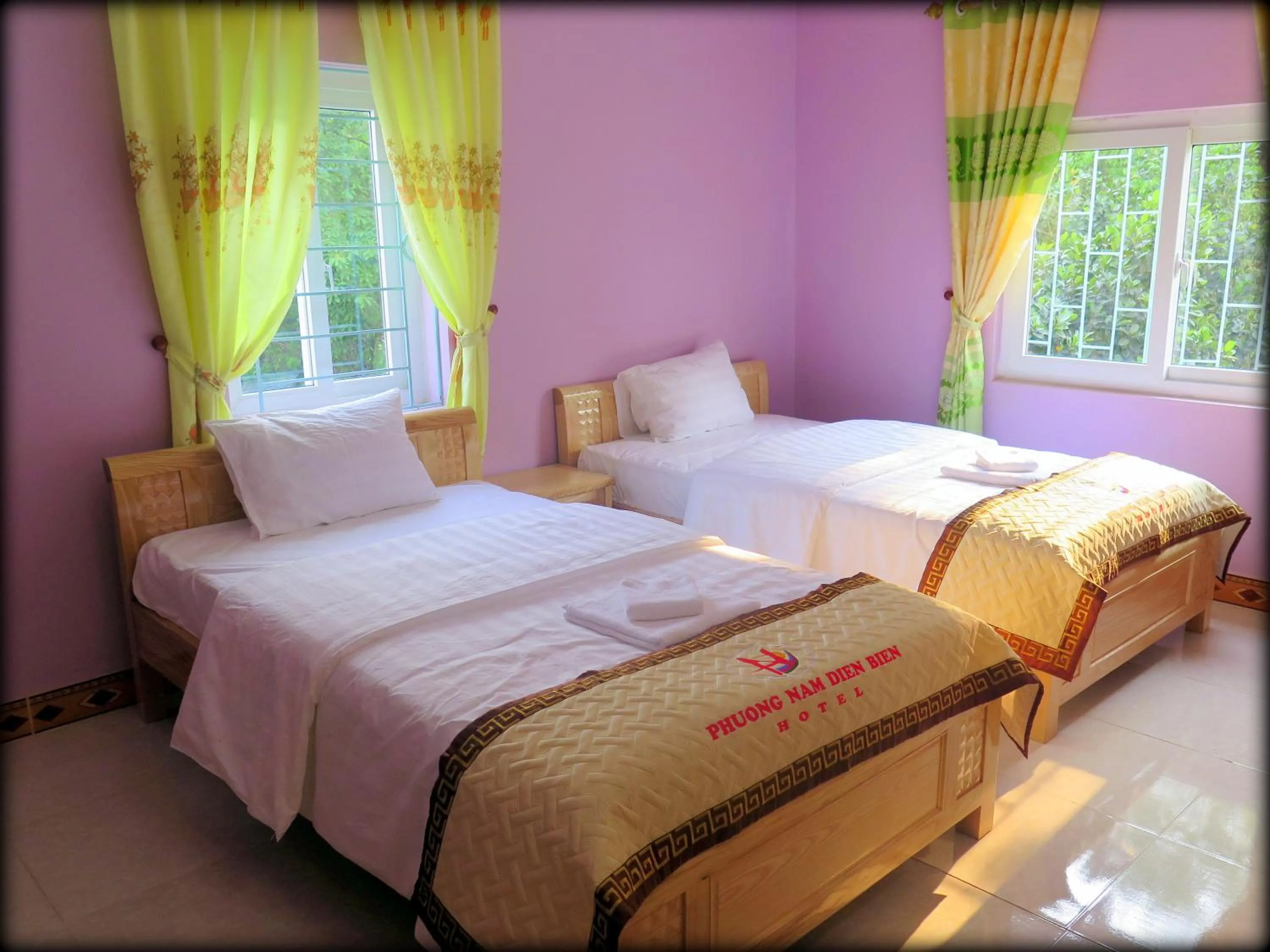 Bed in Phuong Nam Hotel