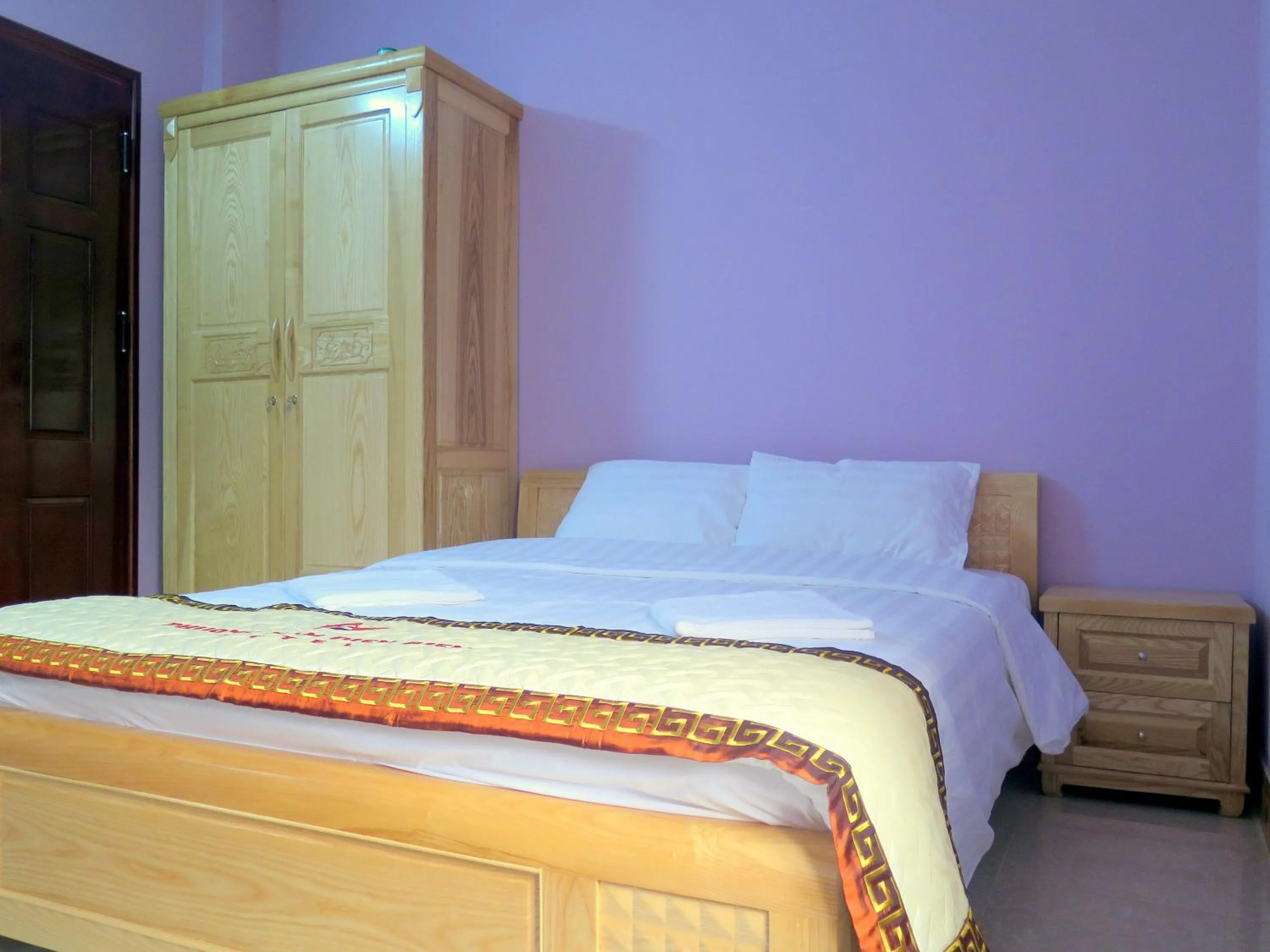 Bed in Phuong Nam Hotel