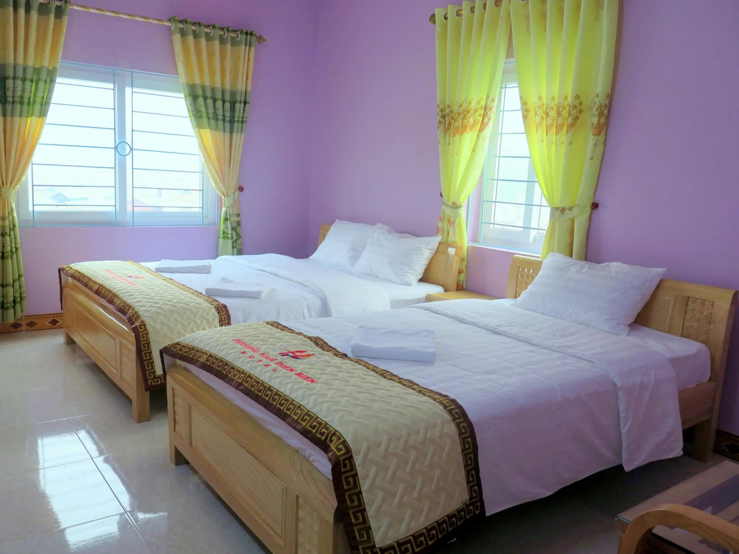 Bed in Phuong Nam Hotel