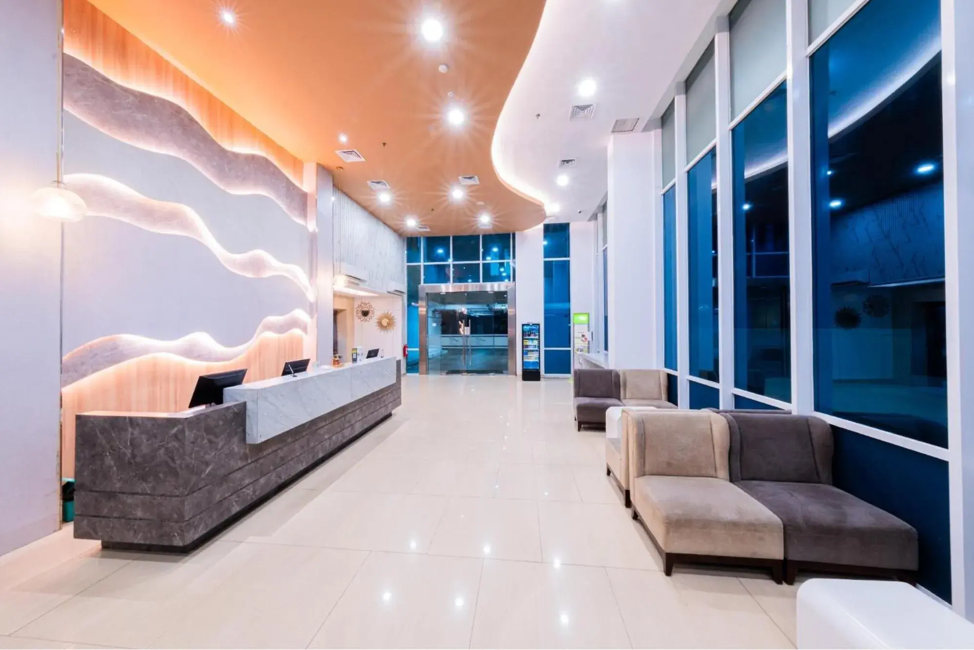 Living room, Bed in Whiz Prime Hotel Balikpapan Living room, Bed in Whiz Prime Hotel Balikpapan