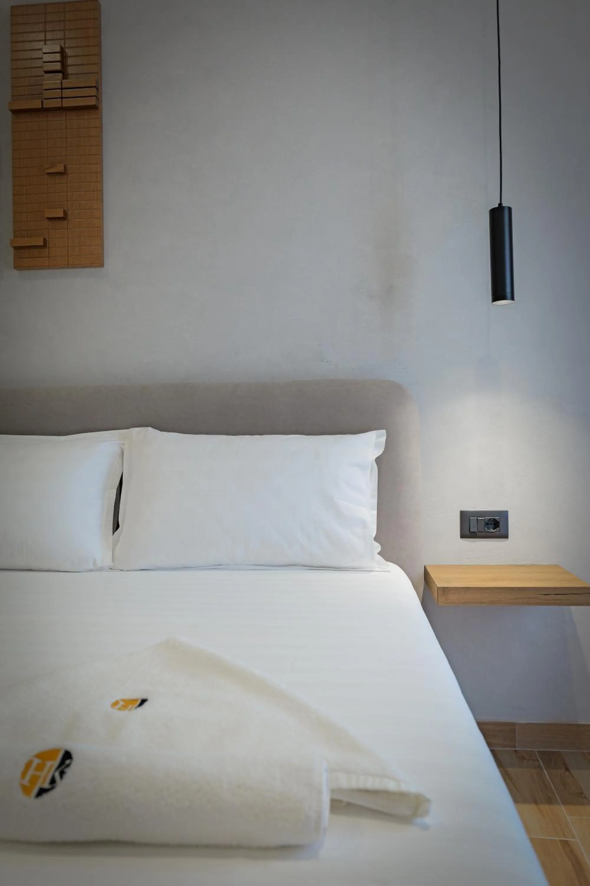 Bed in Hotel Kroi