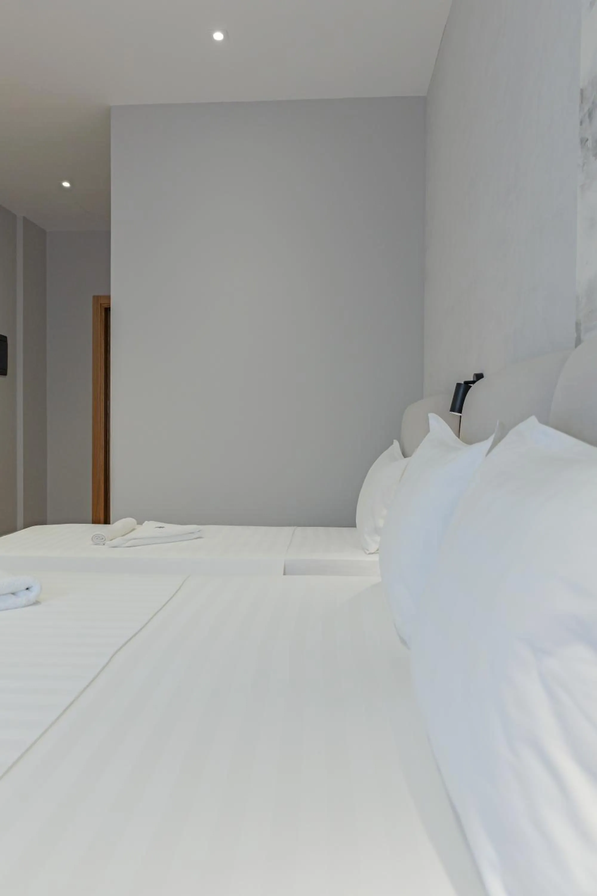 Bed in Hotel Kroi