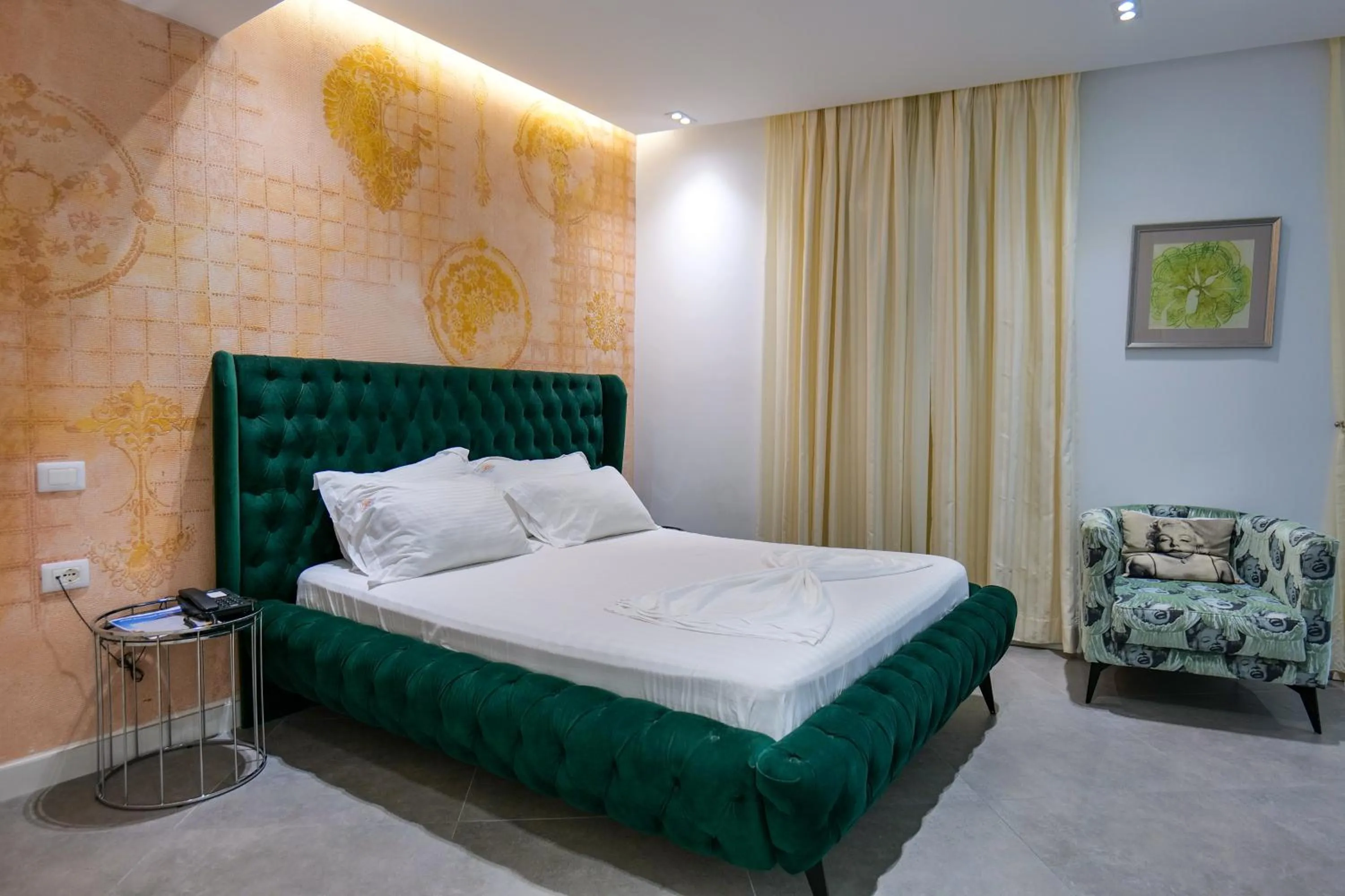 Bed in HH Boutique Hotel