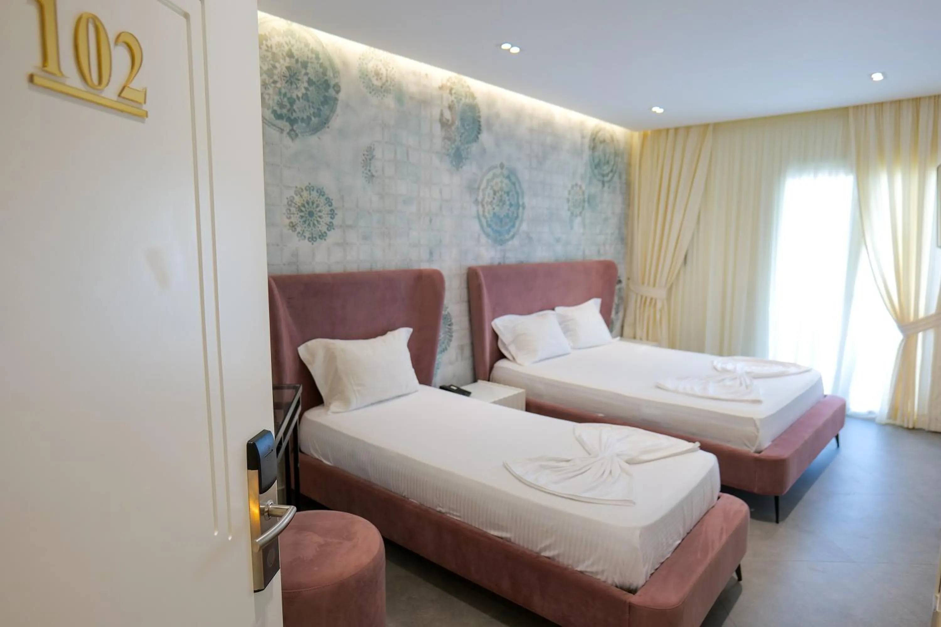 Bed in HH Boutique Hotel